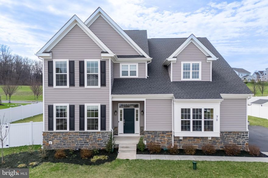 Thoughtfully upgraded and well maintained, this 2023 home features wide plank LUXURY VINYL FLOORING for a seamless, inviting feel. A light-filled SUNROOM offers a perfect spot to relax, while a LARGE BACK DECK with both a COVERED and OPEN AREA equipped with a GAS CONNECTION for your BBQ grill extends living outdoors. The backyard is FULLY FENCED giving you privacy. A MAIN-LEVEL FULL BATH adds convenience and connects to a study that can serve as a guest room or bedroom. The kitchen features grey cabinetry, a blue island, quartz countertops, tile backsplash, and pendant lighting, with Whirlpool double ovens, a gas cooktop, and a Samsung refrigerator, completing this well-appointed kitchen. Additional upgrades include a 3-STAGE WATER FILTRATION SYSTEM and BLINDS THROUGHOUT, and a 3-CAR GARAGE. This home is move-in ready. The unfinished lower level offers ample storage and is PLUMBED FOR A BATHROOM, allowing for customization. A recent home inspection report is available upon request.