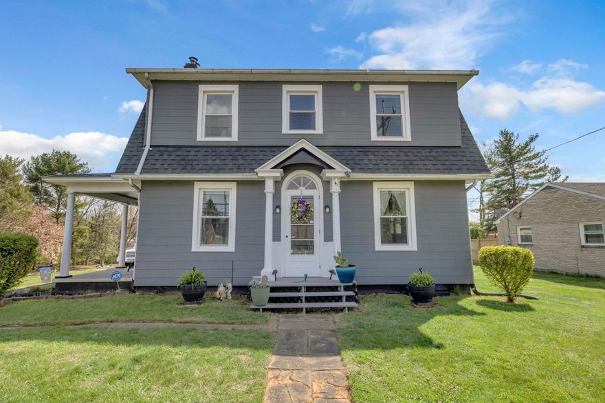 Charming 3-bedroom, 1-bath (capability for extra bathroom install), Dutch Colonial on 0.87 acres with Commercial/Residential use and Business Local District (BL) zoning, offering a rare combination of character, versatility, and functionality. This home also features a new roof and windows - 4 years. Connected to Washington County water and sewer, this move-in ready property is conveniently located near restaurants, stores, supermarkets, the Valley Mall, I-81, I-70, and is approximately 10 minutes from Hagerstown Premium Outlets.

The front of the home makes a strong first impression with historic slate front stairs leading to the front walkway and colonial-style entrance. Inside, fresh interior paint and thoughtful custom touches help set the tone throughout the home. Baseboard heating has been removed and replaced with floor and shoe molding throughout the finished areas, adding to the clean, finished look.

The kitchen offers granite countertops, a custom window breakfast nook and a built-in table designed to lift toward the ceiling for easier cleaning, with removable benches. All kitchen appliances convey. Access from the kitchen to basement and back porch.

The dining room features linoleum flooring over original hardwood, floor molding, chair molding and threshold molding. A handmade China cabinet and chandelier convey.

The spacious living room features a high ceiling, original freshly stained durable hardwood flooring, and a wood-burning stove equipped with a 7,000 BTU electric blower for heat. The front door entrance takes you directly into the living room. A real French door on the left side opens to the left-side porch. Switches in the living room operate the exterior light poles on the property. An LED lit stairway connects the living room to the upper level.

Entire 2nd floor is recently painted and has original hardwood flooring. All of the bedrooms have closets. Master bedroom has a handmade built-in vanity.  

The bathroom has been fully remodeled with custom finishes. Includes an oversized sink, ceramic tile in the shower with a marble shelf and marble in the rest of the bathroom. Leather-textured vinyl above the wainscoted walls. Bathroom has a custom closet with ample storage.

The attic is accessible from the top of the stairway by pull-down steps, offering ample storage space and foam insulation. Equipped with an automatic fan, cut off switch accessible via bathroom closet.

The basement includes recently painted walls, brand new hot/cold water plumbing supplying the whole house and a mud sink. Washer and dryer - 6 years old. Upgraded electrical, new PVC pipes, and new main support beams. 2 Trane air/heat units (4 years old), 1 in basement, 1 in attic.

Outside, the property continues to impress with multiple functional structures and unique outdoor features. There are 3 garages which hold 6 cars. All are fully equipped with electrical power and outlets throughout. The metal garage is equipped with its own separate breaker box and offers plenty of outlets. Attached to the one car garage is an open carport used for gardening tools.    A backyard shed can be used as a workshop/landscaping tools storage area and is currently under restoration. There is a cabin/office behind the picnic area and rock wall.

The picnic area includes built-in water and electric, a built-in mini barbecue, and furniture that conveys. Behind it, the historic Civil War rock wall adds character and outdoor appeal. The long blacktop driveway is 2 years old and allows for tons of parking. Outdoor gardens throughout the property with hundreds of perennials and coral carpeting that lines the rocks. There are 3 dogwood trees, 1 Magnolia tree, and 1 Elderberry tree.

Property is being sold as-is.