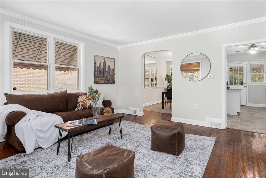 HUGE PRICE REDUCTION! Check out this newly updated 3BR 1.5 Bath .   Granite & SS appliances,  newly refinished original hardwood throughout, freshly painted throughout,  beautiful rear courtyard, and much more!  Close to everything you love about Forrest Park - Shopping, dining, transportation and a Golf Club just down the street.  Best Location. Best Price in all of 21216!  Don't miss this one!