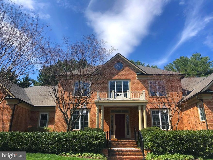 stunning custom built all brick home in the gated enclave community. high-end appointments thru-out including felt-lined built-ins, silk draperies, gold plated light fixtures, hand-crafted railing, designer closets and more. chef's kitchen with large pantry flows into family room. dramatic formal living room with gas fireplace. first floor primary with dual walk-ins and marble ensuite offering heated floors, dual vanities, water closet & auto shades. upper level with 3 bedrooms & 2 full baths including a steam shower. catwalk. finished lower level with full bath. tranquil rear yard includes a heated pool w retractable cover and lush landscapes. exquisite from top to bottom. great community amenities and ideal location.