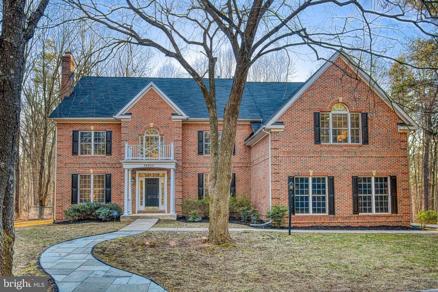 This exquisite home is a rare gem, nestled on over 12 acres of prisitine land, offering unparalled privacy and serenity. Boasting 5 bedrooms, 4.5 baths and 4 fireplaces including a luxurious owner's suite with new amenities and ample walk-in closets, it exudes comfort and elegance. The gourmet kitchen, complete with a breakfast bar and dining area, is perfect for entertaining, while the open layout and abundant natural light create a welcoming atmosphere throughout. With a grand brick front, hardwood floors, and new paint and carpeting, every detail has been meticulously crafted. The lower level features a versatile space with a bedroom, full bath large recreation room, flex room and plenty of storage. Truly a must- see property for those seeking the epitome of luxury living.