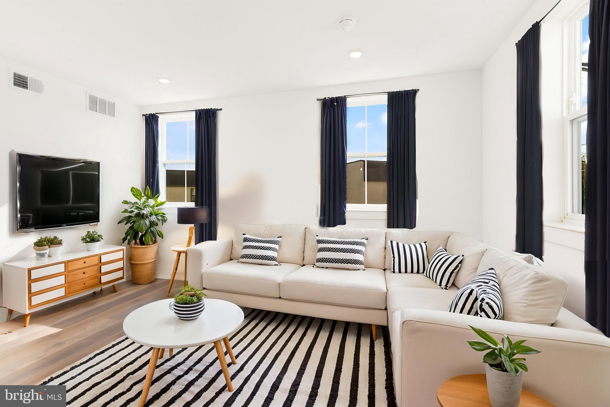 Available NOW | Leasing Special: 1 month FREE on a 13-month lease! Gross rent is $1,725/month - listed rent of $1,592/month reflects leasing special.
Step into a world of modern luxury with these beautifully designed units, tailored to enhance your well-being. Unit #102 is a 2 bedroom, 1 bathroom apartment on the first floor. Bathed in natural sunlight, each open floor plan showcases sleek finishes and thoughtful details. The ductless mini-split A/C ensures year-round comfort, while the convenience of in-unit laundry adds ease to your daily routine. Gleaming hardwood floors and recessed lighting flow throughout, creating an inviting atmosphere. The gourmet kitchen, featuring stainless steel appliances and abundant cabinetry, is perfect for culinary adventures. Spacious bedrooms offer a peaceful retreat, complete with ample closet space and sliding doors. Pamper yourself in the luxurious ensuite bathrooms, with stylish tiling, lighted vanities, and sleek bathtub-shower combos. This professionally managed building is ready to welcome you home—don't miss this opportunity! Please note: Photos & video tour may be from a similar unit; exact layouts and finishes may vary. Leasing special details: Tenant to receive a credit upon move-in to use how they choose during the lease term. Listed rent reflects leasing special. Leasing specials are for new residents only.
Lease Terms:
Generally, 1st month, 12th month, and 1 month security deposit due at, or prior to, lease signing. Other terms may be required by Landlord. $55 application fee per applicant. Pets are conditional on owner's approval and may require an additional fee, if accepted. (Generally, $500/dog and $250/cat). Tenants responsible for: electricity, cable/internet, and a flat water fee ($35 for 1 bed & $55 for 2 bed). Assigned off-street parking is available for an additional $295/month. Landlord Requirements: Applicants to make 3x the monthly rent in verifiable net income, credit history to be considered (i.e. no active collections), no evictions within the past 4 years, and must have a verifiable rental history with on-time rental payments. Exceptions to this criteria may exist under the law and will be considered.