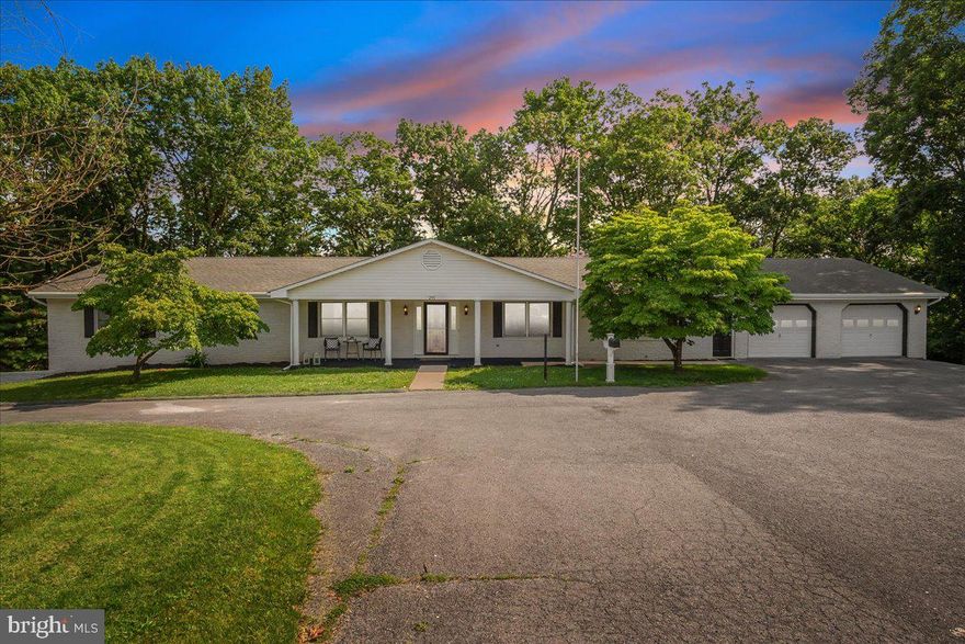 OFFER DEADLINE: SATURDAY, JULY 5TH AT 12 PM. RARE OPPORTUNITY to purchase an exceptional CUSTOM ranch style home with over 4,000 SQ. FT. OF FINISHED LIVING SPACE on over 2 ACRES, located in a PRIVATE cul-de-sac. The MAIN LEVEL alone has 3,200 sq. ft. of finished space with SPACIOUS rooms throughout, such as an 18’ x 14’ Living Room, a 39’ x 11’-4” glass enclosed SOLARIUM, a 20’ x 15’ FAMILY ROOM, a 30’ x 15’ Owner’s Bedroom and other large rooms. Significant upgrades include VINYL PLANK FLOORING on most of the main level, an UPSCALE KITCHEN including cherry cabinets with new QUARTZ countertops and MOSTLY NEW APPLIANCES, a true LUXURY OWNER’S BATHROOM and renovated hall bathroom.  The master bathroom offers new ceramic tile floor,  new freestanding soaking tub, new tile shower with new glass door, and vanity offers new quartz counters. The main level includes 3 bedrooms, that includes two OWNER'S BEDROOM SUITES and 3 full bathrooms. Brand NEW CARPET was just installed in two bedrooms with vinyl plank flooring in the other main level bedroom.  You will love the huge solarium with twelve, 6’ tall CASEMENT WINDOWS overlooking the TREED REAR YARD. The lower level includes a 20' x 15' Recreation Room and a huge 4th bedroom that measures 30' x 14'. Plus, the entire house was just professionally painted. The heat pump is only 5 years old and the roof 10 years old. The OUTDOOR LIVING SPACE is unbelievable with a 63’ x 21’ DECK, a 38’ x 11’ SCREENED-IN PORCH, a 32’ x 8’ COVERED FRONT PORCH and also an 11’ x 11’ screened GAZEBO with a concrete floor. There is an oversized 2-CAR GARAGE on the main level that is 30’ x 28’ and a separate 3-CAR GARAGE on the lower level. You will fall in love with everything this home has to offer.