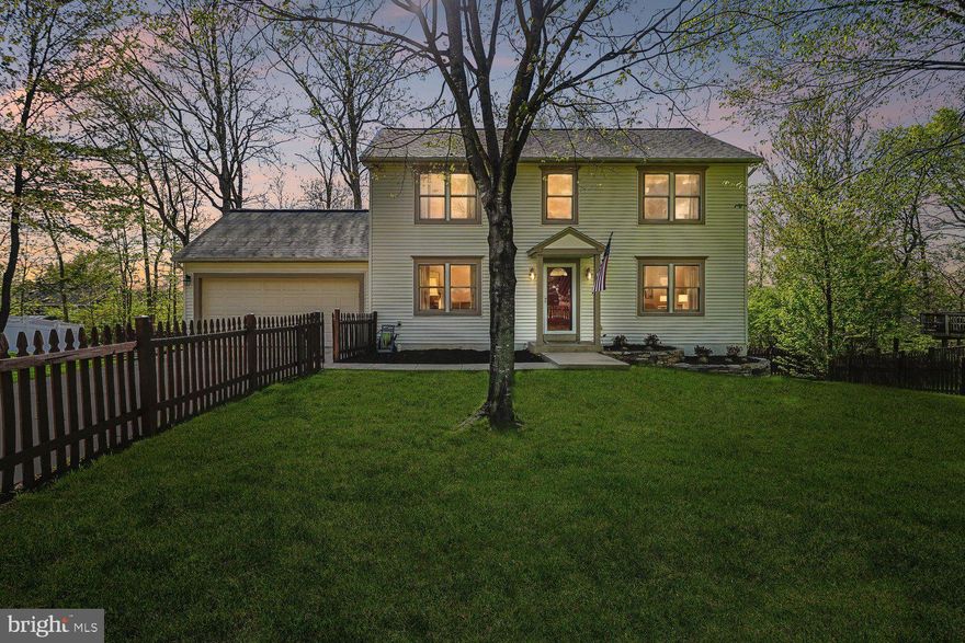 Tucked away on a quiet street in the heart of Herndon, this reimagined residence offers a compelling blend of modern refinement and relaxed suburban charm. Encompassing approximately 2,500 square feet, this four-bedroom, two and a half home unfolds across over a quarter-acre.  The fenced-in manicured, grassy lot is an idyllic setting that feels both private and connected.

Thoughtful enhancements include new LVP in the lower level and a beautifully updated kitchen outfitted with sleek stainless steel appliances and polished quartz countertops. A French door in the kitchen leads to a large deck with stairs down to a lower level patio.  Designed with both everyday living and elevated entertaining in mind, the main level is awash in natural light, and anchored by a welcoming family room and a massive dining room that invites both intimate evenings and lively gatherings.  The expansive two-car garage off of the kitchen has room for storage.

Upstairs, four well-proportioned bedrooms provide a sense of retreat, led by a serene primary suite featuring windows on both the front and back of the house The lower level expands the home’s versatility, offering a fully finished walkout basement complete with a bonus room, and ample space for recreation or relaxation, seamlessly extending to the expansive backyard beyond.

Positioned just minutes from the vibrant offerings of downtown Herndon, the Herndon Metro Station, and Washington Dulles International Airport, the home also places nature within easy reach, with the scenic W & OD Trail just a mile away. Nearby playgrounds, parks and a local golf course further enrich the lifestyle.