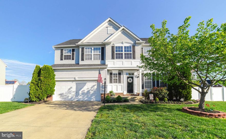 La Plata Beauty!!! First one in the door is the winner!! The moment you walk in the door of this amazing home in sought after Agricopia on large corner lot...main level features two story foyer, hardwood floors throughout most of the first level, formal dining room, and living room. Kitchen with stainless steel appliances which opens to family room w/ fireplace. Doors leading to deck and backyard oasis!! Upper level includes 4 bedrooms and 2 full baths. The spacious master suite has his and hers walk in closets and lux master bathroom... soaking tub, separate shower, his/her vanities, ceramic floors and skylight. All bedrooms have ceiling fans. Unfinished basement ready for your personal touches w/ rough in for bathroom. Two car garage. Outside...BBQs and family gatherings will be a treat w/ full fenced level backyard, 550 sq ft deck, two sheds, and a fully manicured yard! Meticulously  landscaped yard... front side and back. This one won't last long!!