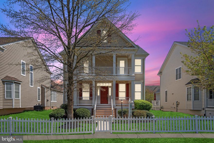 Welcome to this exquisite Putnam model home, nestled in the highly sought-after community of South Riding—renowned for its extensive amenities and vibrant lifestyle.
This exceptional Village Series single-family residence by Toll Brothers offers over 3,600 square feet of thoughtfully designed living space across three beautifully finished levels. A unique highlight includes private porch access from the bedrooms—an ideal bonus that enhances the home’s flexibility.
For those who love the outdoors, this home truly delivers. Enjoy tranquil views of a lush tree preserve and expansive lawn from two covered porches. A spacious Trex deck and paver patio create perfect settings for al fresco dining, entertaining, or simply relaxing in your private oasis. Inside, the main and upper levels feature fresh, neutral paint and elegant hardwood flooring that flows seamlessly throughout the primary living areas. The sunroom, also finished in hardwood, offers a bright retreat—ideal for plant lovers or quiet relaxation. Upon entering, the inviting foyer opens to a formal dining room on the left and a private home office with French doors on the right. Abundant natural light pours in through large windows, creating a warm and welcoming atmosphere throughout the home. At the heart of the main level lies a stunning gourmet kitchen outfitted with updated stainless steel appliances, granite countertops, an expansive island, and a stylish neutral backsplash. Adjacent to the kitchen, the spacious casual dining area offers the perfect spot for family meals, while the generous family room—centered around a cozy gas fireplace—provides a comfortable gathering space. The sunroom—accessible from the family room—offers incredible flexibility and can serve as a second office, mudroom, craft space, or serene plant haven. From here, step onto the back deck or head into the attached two-car garage, which includes extra storage space. Upstairs, the luxurious Primary Suite is a private retreat, complete with a large bedroom, an elegant sitting area, and French door leading to a private covered balcony—perfect for morning coffee or evening relaxation. The suite also features two walk-in closets and a spa-inspired bathroom with a soaking tub, a separate shower, dual vanities, and a private water closet. Three additional spacious bedrooms and a beautifully appointed hall bath with double vanities complete the upper level, along with a conveniently located laundry room.
The finished lower level is designed with entertainment in mind. A large recreation room offers defined zones for a bar, TV lounge, and pool table. A full bath and a generous storage area with an egress window complete this versatile space. This home epitomizes modern, sophisticated living, offering abundant space, stylish upgrades, and incredible versatility in a prime location.Recent Updates: Roof replaced by previous owner (approx. 2017), Lawn irrigation system installed in 2022, Upper-level HVAC: New Carrier AC and attic unit installed in 2022 (includes 2-year labor warranty), New GE stainless steel kitchen appliances added in March 2025 (refrigerator, dishwasher, microwave, and oven) Trex deck boards updated in July 2024; front porch and back deck stained in July 2024,The entire exterior power washed and painted (including railings) in October 2024, Interior painting scheduled for March 2025, Basement wet bar added in 2023,EV Charging Outlet, Google Nest Thermostats, Custom Built Closet organizers in the Pantry, Master Bedroom and secondary Bedrooms in 2023, Garage Floor and Walls Painted in April 2025, Recently Mulched and Landscaping.