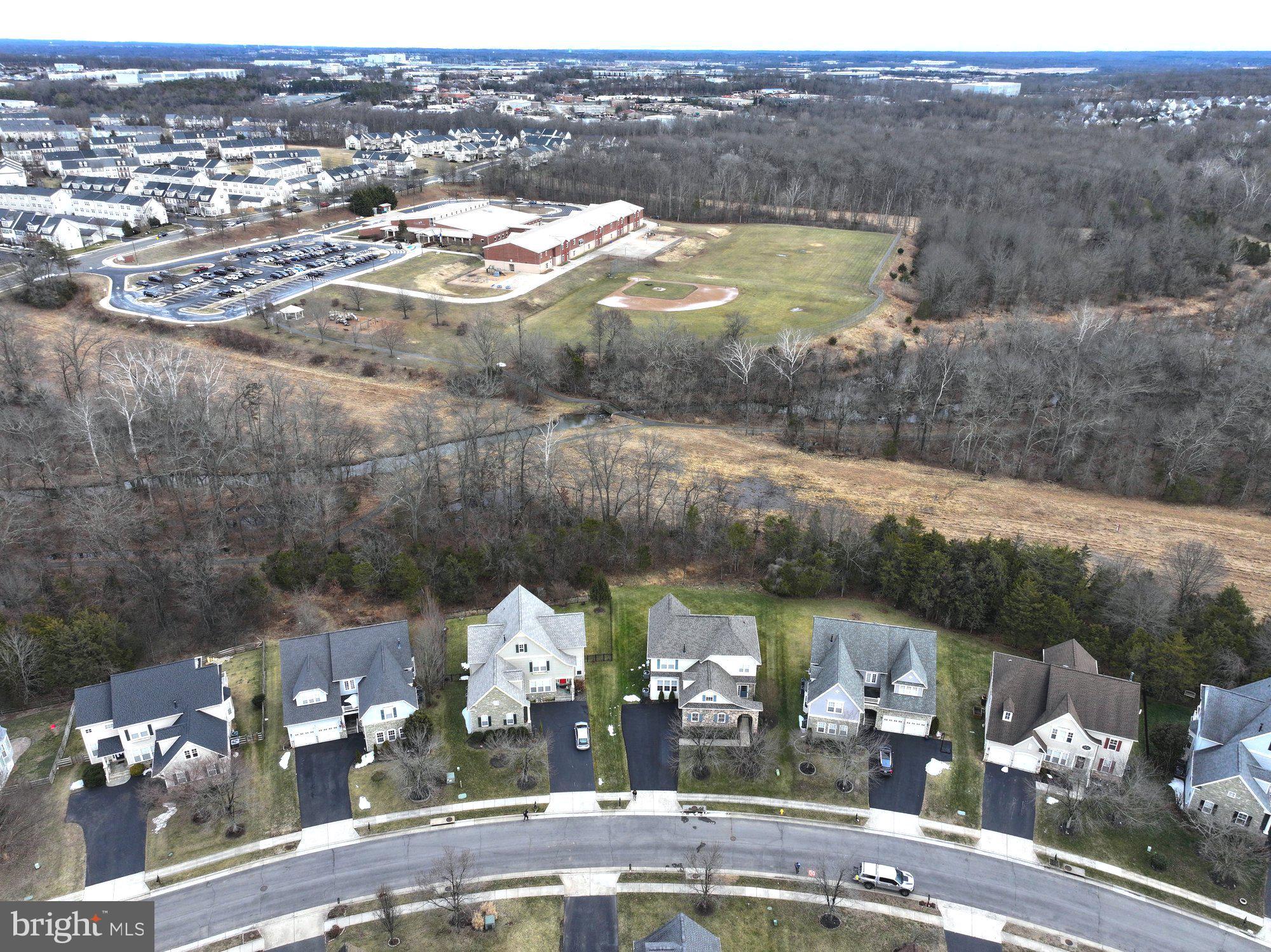 9322 FALLING WATER DRIVE