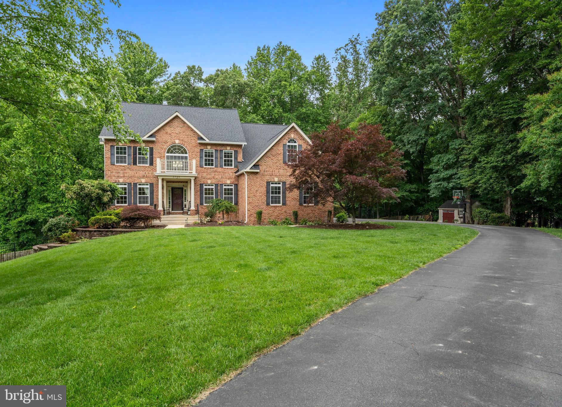 ****Elegant 6 bedroom stately colonial on a private 1 acre lot with Inground Pool!**** Welcome to this exceptional colonial, gracefully situated on a beautiful landscaped lot with an abundance of privacy! This timeless home offers a perfect blend of classic charm and modern amenities, ideal for both luxurious living and grand entertaining. Step through the welcoming entryway into a spacious, light-filled interior featuring refined architectural details, hardwood floors, and custom features throughout. The formal living and dining rooms provide an elegant setting for gatherings, while the expansive gourmet kitchen opens to an open and inviting 2 story family room with gas fireplace and lots of windows for plenty of natural light. A main level office is perfect for remote working, toy room, or guest room. Upstairs offers 4 bedrooms including a luxurious Master suite with tray ceilings, spa like bath and huge walk in closet with custom shelving. 2 upper bedrooms share a Jack and Jill bath in addition the 4th bedroom is an ensuite with private bath and makes the perfect guest suite. A favorite feature of this lovely home are the 2 staircases, including a rear staircase that leads into the kitchen and an entryway staircase for a grand entrance. The finished basement adds versatile living space and includes a media room, custom bar, bedroom and workroom/possible 7th bedroom. Outside, a stunning inground pool anchors the backyard oasis, surrounded by beautiful hardscaped flower beds and mature trees for privacy. ****Recent Updates include- New Roof, New HVAC, Fresh Paint & Carpet, Pool Re-Surfaced, Decking and Deck Rails, Asphalt Driveway has just been seal coated**** This home offers the perfect blend of privacy and convenience, just minutes from top-rated schools, shopping and restaurants. Easy commute to AAFB. Don't miss your opportunity to own this extraordinary home that truly has it all!