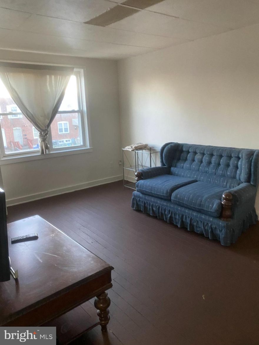 fully rehabbed top floor apt with central air, wood flooring, bright big kitchen....