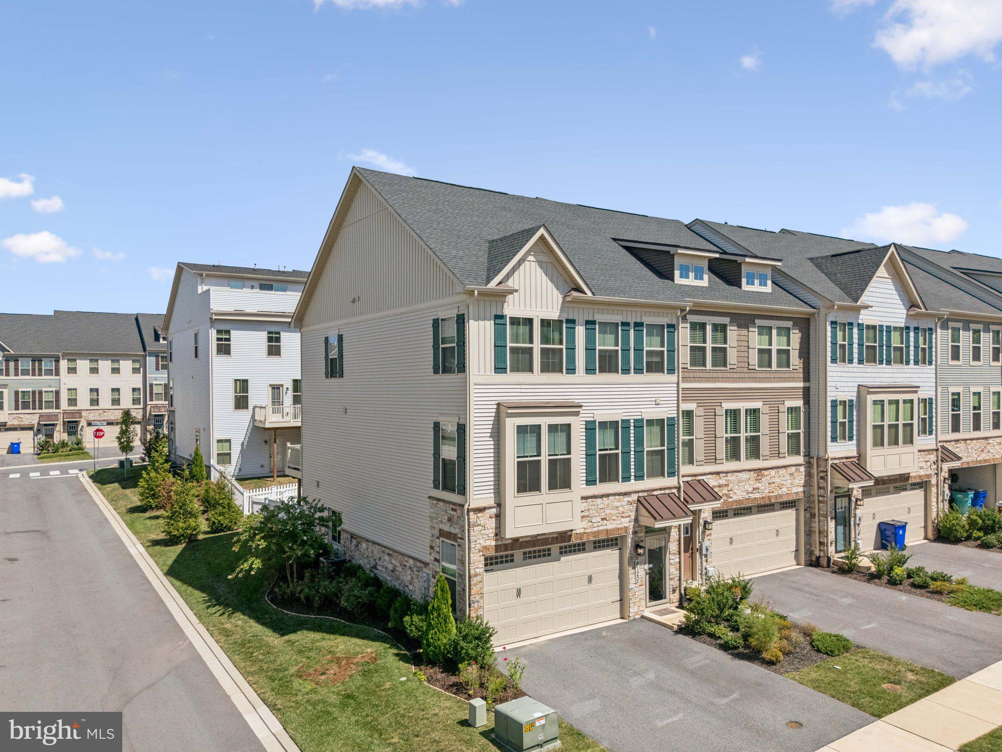 15k price reduction, open Sun Oct 12th 12-2.  Gorgeous 3 years young end unit 2 car garage townhome with all the bells and whistles!  Open concept main level boasts high end laminate flooring, quarts countertop kitchen w/ upgraded stainless steel appliances, upgraded pantry/storage,  a half bath, and natural light everywhere you look. 3rd Level includes 3 bedrooms, hall bath, laundry room w/ upgraded washer and dryer, primary bedroom w/ upgraded closets organizers, large shower,  Lower level could be used as tv room, office, or 4th bedroom.  Exterior features include largest trex deck in neighborhood and a fully fenced rear yard.  Large storage area in addition to the 2 car garage.  All of this in one of Frederick county's most commutable locations-minutes to 70,270, 15, and 340!  Nothing to do but move in and enjoy!