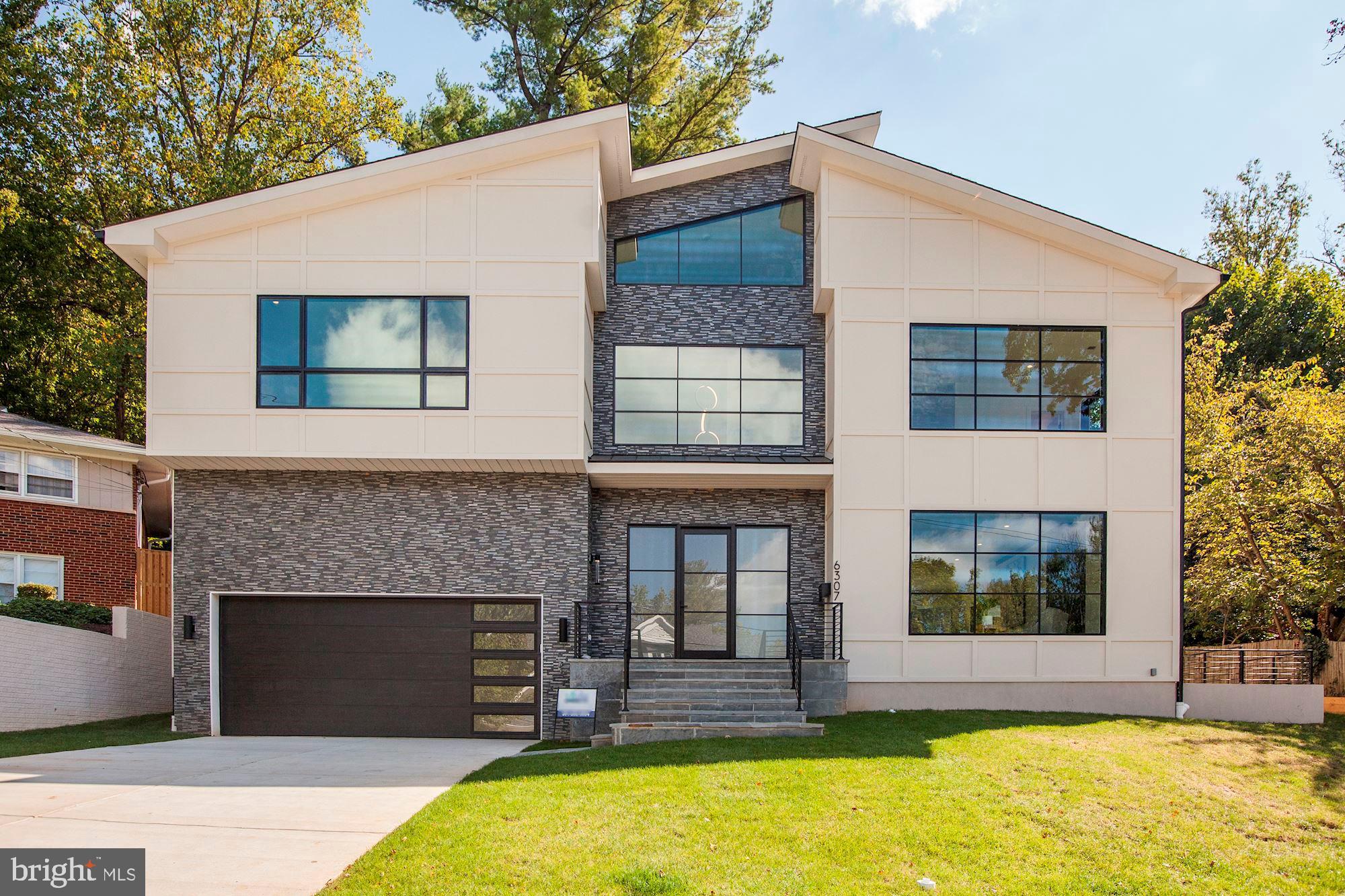 Contemporary new built home with a lot of stunning details and thoughtful, open floorplan in beautiful Bannockburn. This wonderful 5 bedroom/5 bathroom/2 half baths house has a modern kitchen with great finishes which opens to a big family room with dining area and huge fireplace. Spacious master bedroom with inviting master bathroom. Huge windows and daylight-filled rooms throughout the whole house. Walkout basement has a big recreation room, bonus room, storage and an additional bedroom with bathroom. Easy access to downtown Bethesda, Washington DC and VA. This newbuilt is truly a must see! Please see floorplans in documents.