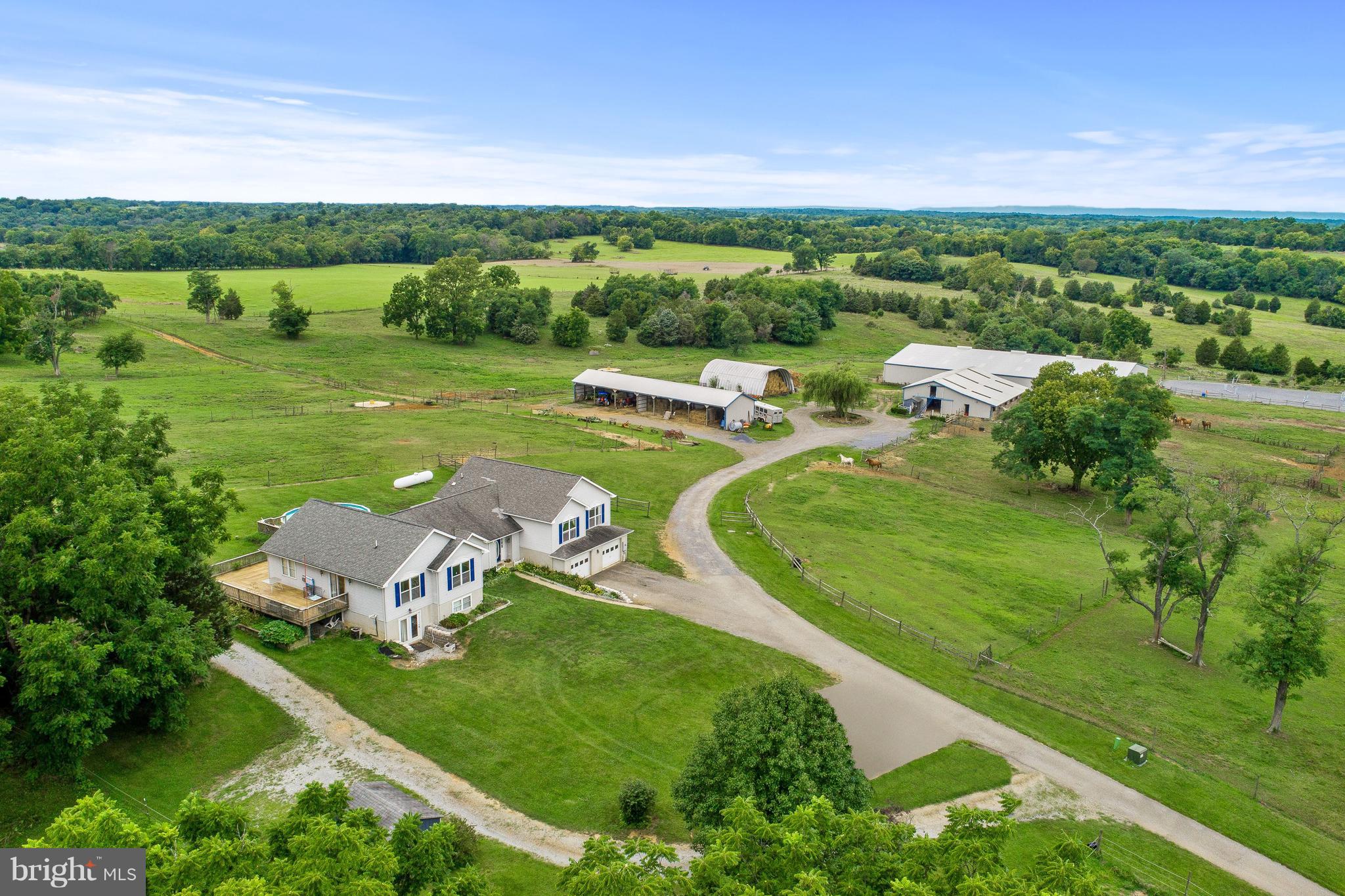 This breathtaking 131 acre equestrian farm is complete with 5 bedroom 5 bathroom renovated home. Open floorplan with gourmet kitchen with stainless steel appliances, granite counter tops, and beautiful mountain views. 20 minutes from the Marc train station that commutes into Washington D.C., minutes from Harper's Ferry, and a short drive to Hagerstown, Frederick, and more!