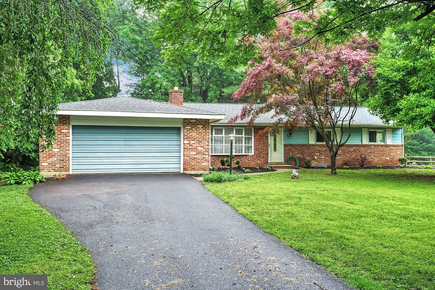 Beautifully updated ranch home in an amazing development. This home boasts an open and bright floor plan with contemporary appointments and paint colors. Large living room with a custom fireplace; recessed lighting  hardwood floors. Updated kitchen and counter tops;  and stainless appliances. Located Just 10 minutes from all "A" Rated schools, colleges, hospitals, and shopping centers! -