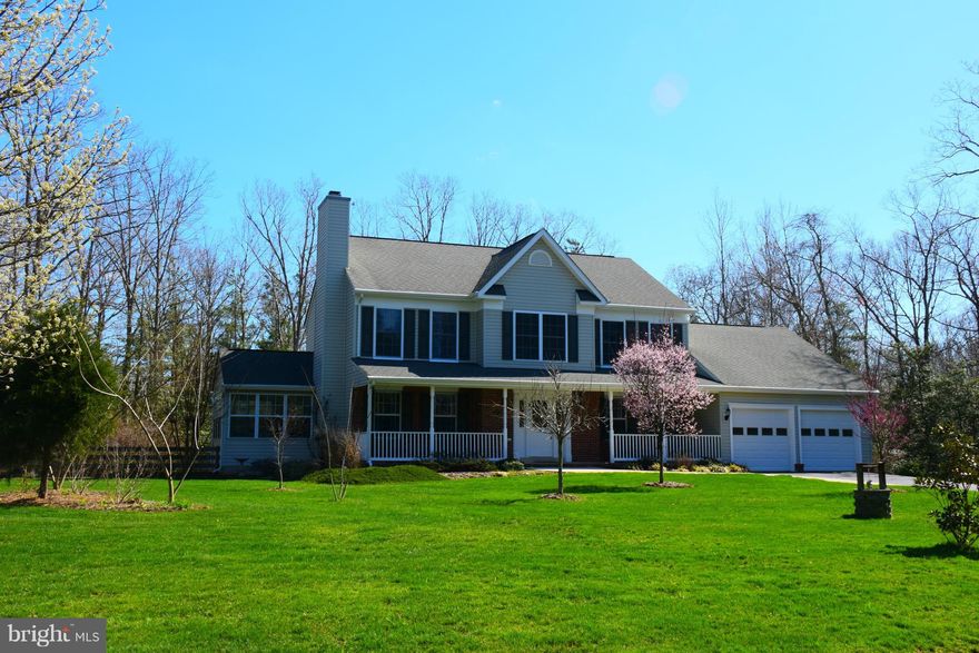 Nice Brick Front Colonial on manicured private 2 acre lot! Hardwood floors in dining room, living room and foyer. Ceramic floors in the kitchen with corian countertops. Large sunroom. Rec room, office, full bath, wet bar and large workshop/ storage area in the basement. This home has new flooring and paint thru out. Whole house humidifier, alarm, water softner system and many more upgrades.