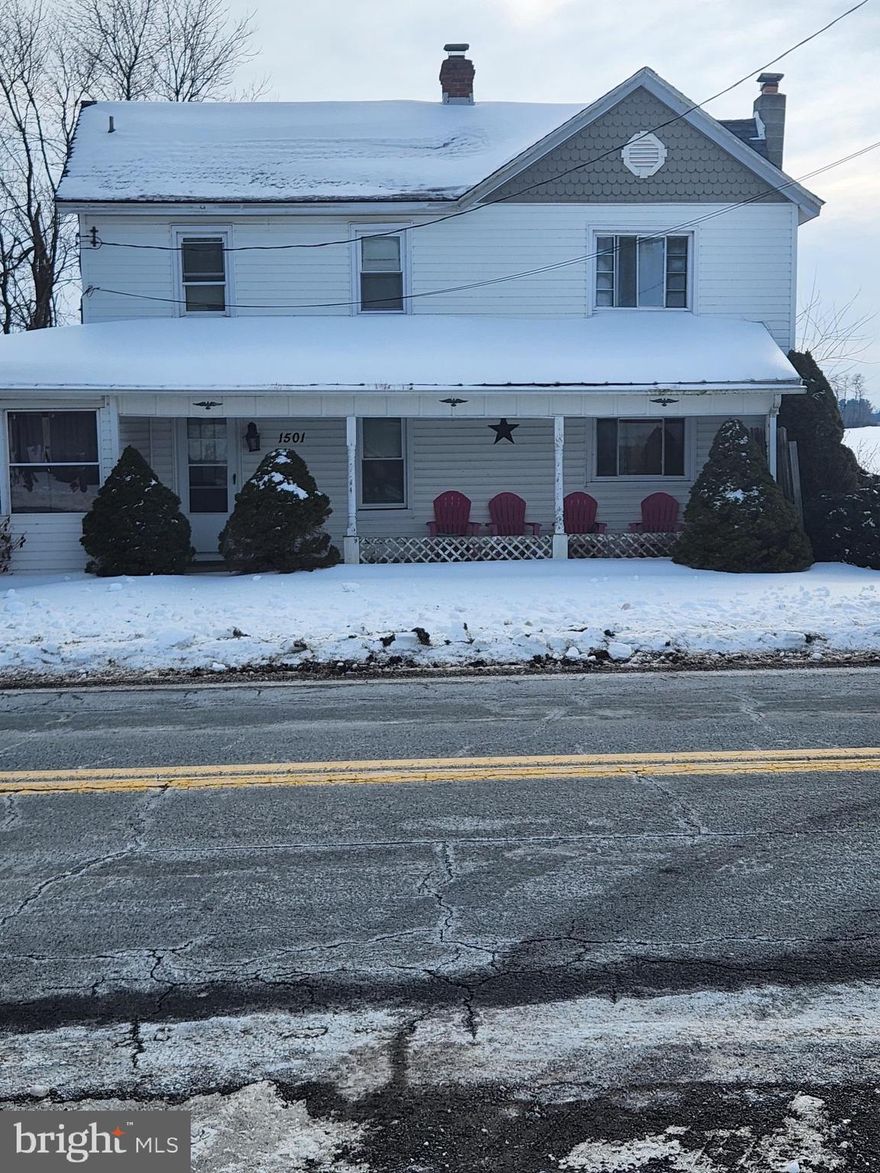 INVESTORS SPECIAL-PRICED TO SELL! Original farmhouse built in 1900 with some amazing updating that was done in 2017. The primary bedroom has a walkout  deck over-looking acres of farmland. Pine flooring on the main level and is believed to be under the carpets in upstairs bedrooms as well. There's a large front porch as well as an enclosed porch off the kitchen for great entertaining  in the warmer months. Windows, Hot water heater and roof were replace approximately 9 years ago. This country home awaits your imagination for great county living with a large scenic lot  of .96 acre.  Use your imagination  for endless possibilities. This home is centrally located with easy access to Washington, Baltimore and Frederick. Don't miss this rare opportunity.