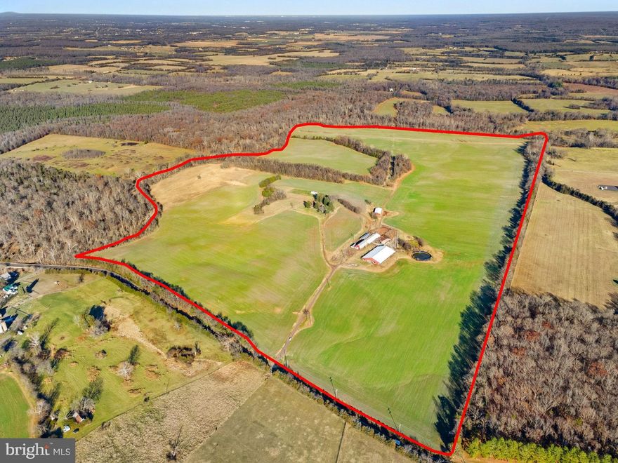 Mountain Valley Farm is a beautiful 242-acre farm with softly rolling fields located around 8 miles east of the Town of Culpeper off Carrico Mill Rd.  The property is bounded by trees on every side, with 1.3 miles of stream frontage on Mountain Run for your recreational enjoyment. An existing farmhouse is perfectly situated on top of a knoll overlooking the farm, offering a panoramic view that encompasses five counties!  The surrounding area was the scene of a notable Civil War battle and will appeal to history buffs and nature lovers alike.  Hunters will appreciate the natural populations of white-tailed deer, turkey, dove, and coyotes.  The property was recently in use as a dairy farm, and has been used for farming and dairying since the area was settled in the late 18th century.  Some farm buildings still exist from when Mountain Valley Farm was more fully utilized, but which are no longer being used or maintained.  These include a dairy barn (which had a herringbone milking parlor with ten units and a 2,000 gal Mueller tank) with holding pen and a 110’ x 170’ stall-free barn that was built in 2007.  Additional structures include a 40’ x 90’ machinery shed and 101’ x 10’ Slurrystore manure structure.  

A conservation easement is in place through the Department of Historic Resources intended to preserve the rural beauty and historical significance of the farm while still allowing improvement and modernization.  Owners may reconstruct one single-family home (up to 4,500 SF above ground) at the site of the current farmhouse, plus one tenant home (up to 3,500 SF above ground) and associated smaller buildings (like detached garages, sheds, gazebos, or a pool house).  A swimming pool or tennis/sport court, and a parking pad are allowed, along with a wide variety of agricultural and farm-related buildings and structures.  Commercial uses are also allowed as long as they are performed inside/within the structures.  The property may not be subdivided; it is being sold as, and must remain, one parcel.  Please refer to the full terms of the conservation easement in the offering memorandum to determine what can or cannot be built on the property.  Mountain Valley Farm occupies a convenient location near Route 15 and Route 3 with easy access to Culpeper, Bealeton, Warrenton, and Fredericksburg.