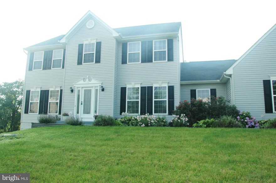 SUNNY & BRIGHT COLONIAL ON 1.16 AC. 4 BR 3FB . Fully finished walk out basement with office and full bath. All four bedrooms are large with large closets. Hardwood floors through out main level. Kitchen has granite counter tops and upgraded cabinets. Side load two car garage with connecting mud & laundry room. Culligan water softening system in the home.Motivated seller .