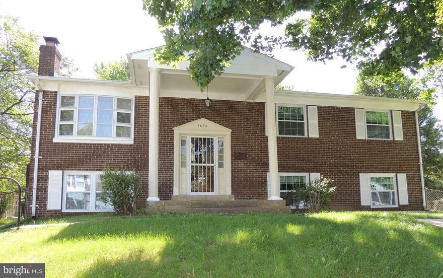 Spacious brick front single family home with 5 BR and 3 BA is ready for a new tenant. A sunny, traditional floor plan with beautiful hardwood floors throughout the main level.  Large window in an open living room leads to a separate dining. Kitchen boasts upgraded granite countertops and newer appliances. Master bedroom with a full attached master bathroom, two additional bedrooms and another full bath in the hallway. Fully finished basement with two extra bedrooms, another full bathroom and a recreation room with a cozy wood burning fireplace. Huge Florida/Sunroom offers a considerable amount of space for entertaining or other activities and has its own heating and cooling! Conveniently located near lots of shopping (including Potomac Mills), Prince William Pkwy and I-95!