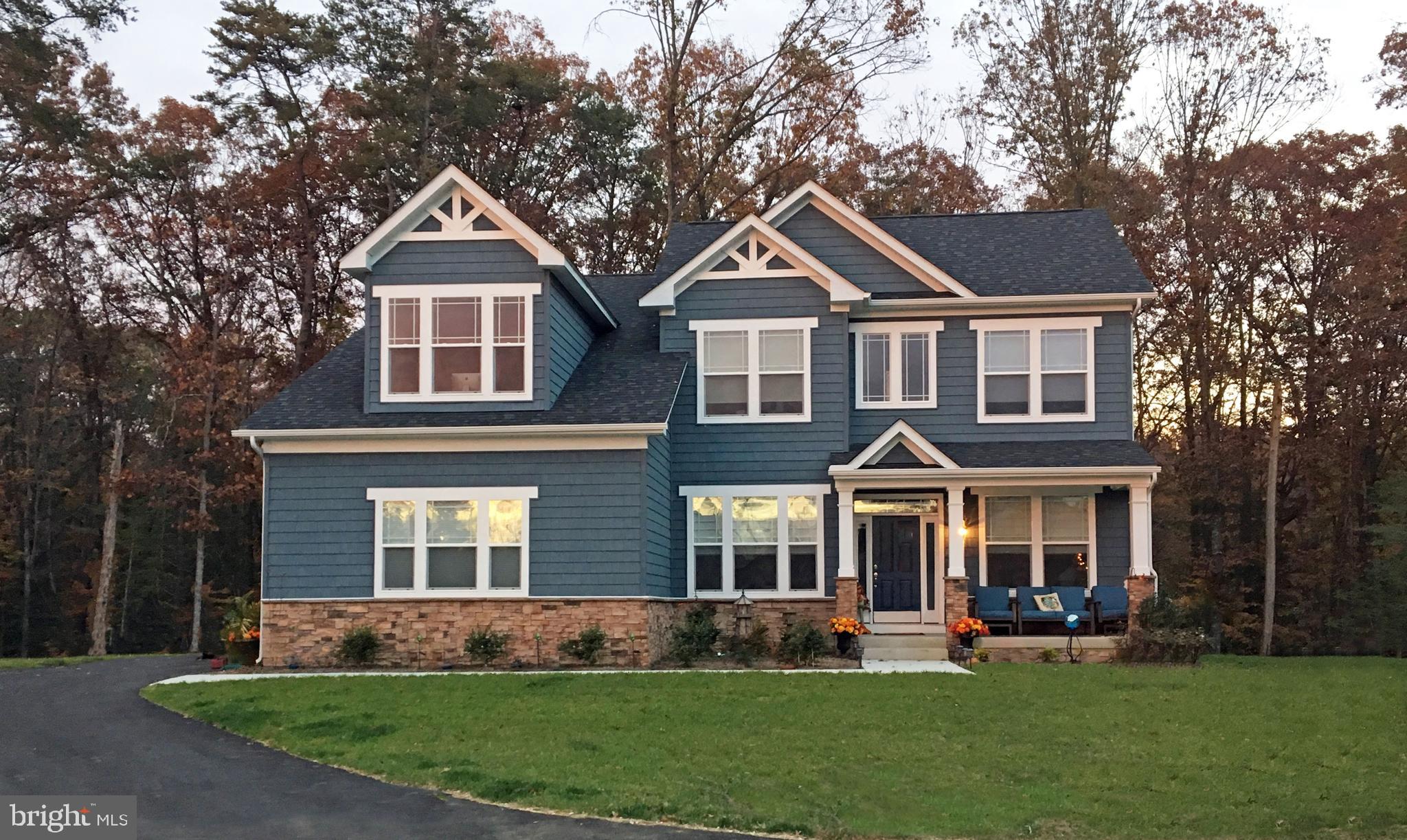 To-be-built Oxford Craftsman floorplan available in our Summergreen Estates community. The Oxford plan is a single family floor plan starting at 2,609 sq. ft. with the capability of up to 4,787 sq. ft. and up to 5 bedrooms. Choose from hundreds of luxury options and finishes to design a home that is uniquely yours. All our popular features are available such as a gourmet kitchen, stone or modern fireplaces, in-law suite, California spa bath, and basements made for entertaining with theater room, wet bar and much more! We many options to personalize this floorplan, you can build the home that is perfectly suited for your lifestyle.
Photos of similar home are for representation only and may show additional options or upgrades. See New Home Sales Consultant for a complete list of included features.