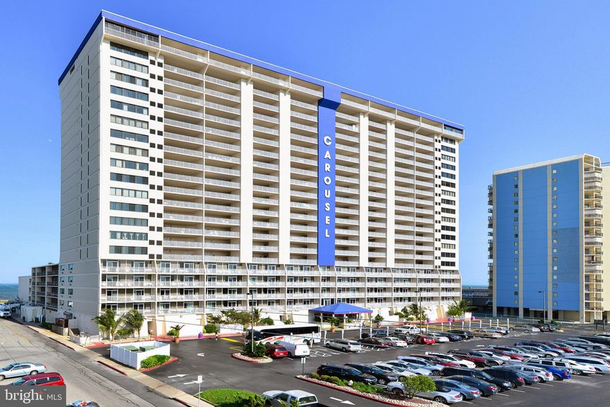 Welcome to the epitome of coastal living at the newly listed 3-bedroom, 2-bath with den renovated oceanfront unit in the Carousel. This Southern Exposure end unit boasts an East-facing balcony with breathtaking views spanning from the northern to the southern horizon, offering an unparalleled vista of the majestic ocean. Step into a realm of modern elegance as stainless steel appliances grace the kitchen, complemented by a stylish subway tile backsplash that adds a touch of sophistication. The entire unit is adorned with tasteful tile floors, creating a seamless and easy-to-maintain aesthetic. Meticulously finished with attention to detail, this residence is a true gem, beckoning you to explore its beauty. The layout is designed to maximize the coastal views, inviting natural light to dance through the living spaces. 
The Carousel doesn't just offer a home; it provides a lifestyle. This well-maintained building is equipped with amenities that cater to every aspect of your leisure and recreation. Feel secure with on-site security, and indulge in the on-site bistro. For those seeking excitement, the Carousel goes above and beyond with unique features such as an indoor ice skating rink, making every winter a wonderland right at your doorstep. Enjoy the luxury of both indoor and outdoor pools, perfect for relaxation or a refreshing swim. Stay active in the exercise room, savor the ocean breeze while grilling at the outdoor grill, or let the little ones frolic in the kiddie playground. The entertainment options continue with a game room for friendly competition and a lounge for casual gatherings. Need a space for meetings or events? The Carousel has you covered with its well-appointed meeting room. In summary, this 3-bedroom, 2-bath oceanfront unit in the Carousel is not just a home; it's a sanctuary of style, comfort, and recreation. Immerse yourself in the coastal lifestyle and experience the pinnacle of beachfront living in this beautifully finished residence. Schedule a viewing today; this is a must-see opportunity that captures the essence of luxury and leisure. New HVAC system in 2024.