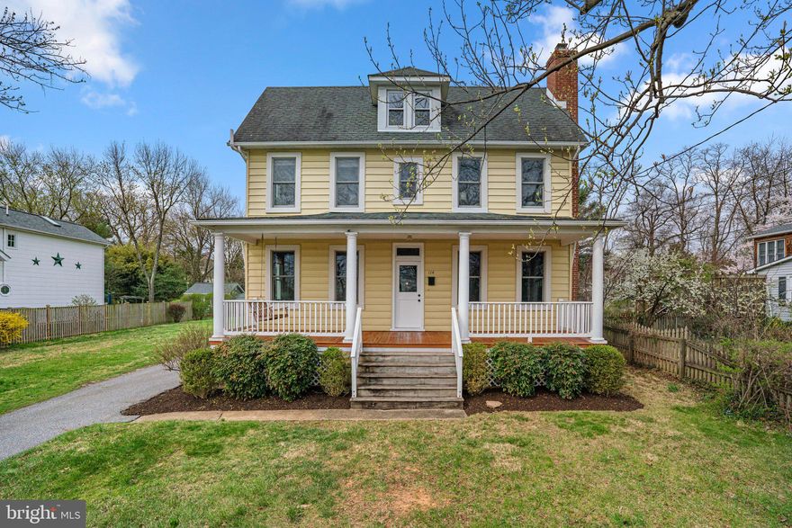 This spacious, updated & endlessly charming 4 bedroom home with a huge covered front porch is close to EVERYTHING that makes Catonsville such a sought after place to live!  114 Mellor Avenue offers an ideal blend of historic character and modern living; set on an exceptional 1/3-acre lot with ample parking.   Featuring high ceilings and large rooms; the light-filled main level includes a bright remodeled kitchen, big main level bedroom, stunning living room addition and an out of this world screened porch that makes every day feel like vacation.  You will love the updated bathrooms, refinished wood floors, high end replacement windows, and modern systems such as the high-efficiency Bosch Combi furnace & tankless water heater and a whole house Space Pac AC unit.  The large primary bedroom on the second floor connects to an entire dressing room and updated private bath. A second gorgeous remodeled bathroom and HUGE bedroom with walls of windows complete this level. Then head up to the third floor with its large loft area; perfect for a home office, kids lounge, whatever you need! The 4th bedroom is up here as well as a large storage area with a window – another super usable space!  The large, unfinished basement offers tremendous storage and additional potential for a workout room, workshop, or other creative uses.  The expansive front, back, and side yards are big enough for all manner of games, relaxing, and cultivating a vegetable or flower garden. Plus you have a large shed for bikes and yard equipment.  Walk or bike to everything that makes Catonsville special, including the library, YMCA with a pool, and the popular summer music events at Mellor Park, just a block away.  This classic home is in a premier location that combines the privacy of a large lot with the convenience of being close to all the amenities Catonsville has to offer!