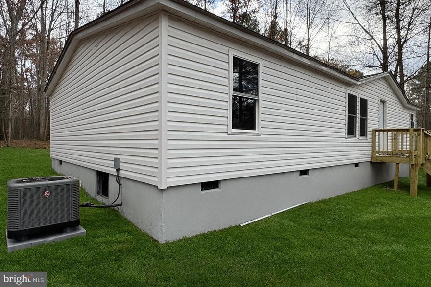 Welcome to 5003 Holly Drive — your peaceful retreat in the heart of Partlow!

A fully renovated home inside and out, nestled on a quiet road surrounded by mature trees, this charming home offers the perfect blend of privacy, comfort, and country living. Step inside to find a bright and inviting floor plan featuring spacious living areas, a modern kitchen with ample cabinetry, and 3 comfortable bedrooms ideal for family or guests. The property’s generous yard provides endless opportunities for outdoor enjoyment — whether you’re relaxing on the porch, gardening, or entertaining under the stars.

Enjoy the best of both worlds with this serene location just minutes from Lake Anna, local shops, and commuter routes to Spotsylvania and Fredericksburg. Whether you’re seeking a full-time residence or a weekend getaway, 5003 Holly Drive delivers the charm and tranquility of Virginia countryside living. The initial photo was AI enhanced to show what the property's potential with grass.