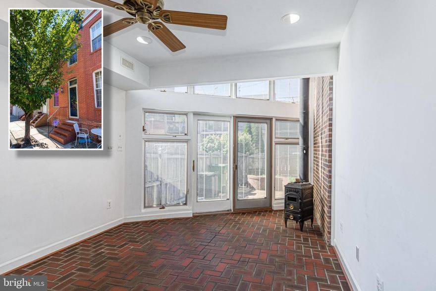 TRULY UNIQUE ARCHITECHTURALLY DESIGNED ROWHOME WITH OVER 1,300 SQ. FT. OF LIVING SPACE!  Features include hardwood floors throughout, an inviting living room and separate dining room with exposed brick, a chef's kitchen with wall oven and cooktop that leads to the dramatic family room with a wood stove and 2 story atrium with floor to ceiling windows.  The 2nd level offers 3 generously sized bedrooms and 1 full bath and the unfinished basement is perfect for storage.  There is also a private rear patio with brick garden area.  Updates include replaced electrical wiring, updated plumbing to copper pipes, & new Pella windows.  Seller to give $1,500 towards kitchen upgrades with an acceptable offer.  Pack your bags and move right in!