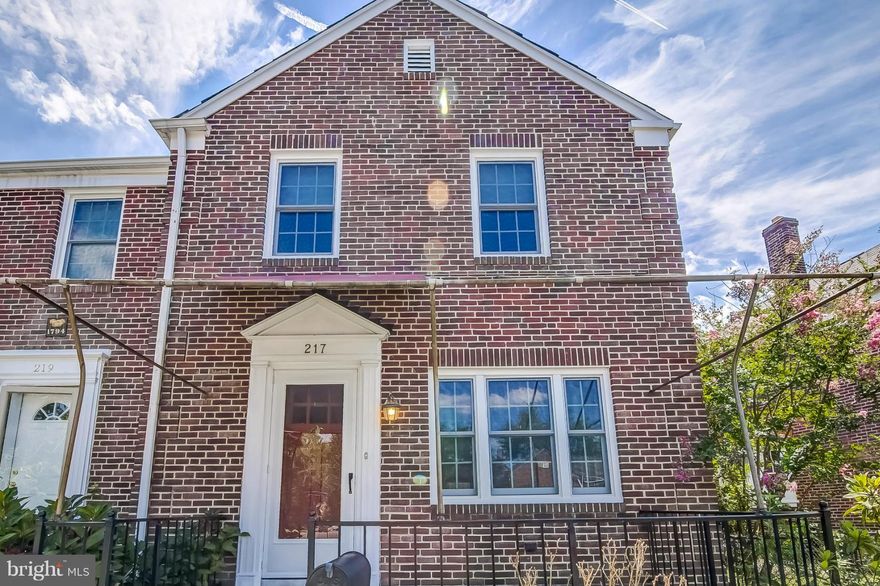 This Rodgers Forge end-of-group is back on the market with a new price. Move right in and love the HW floors, newer windows, kitchen and bath, built-in corner cabinet, 3BR and more. Unwind on the front porch or rear deck while the weather is still nice. Neutral walls make decorating a breeze. Entertain in the finished LL family room. Add'l toilet  provides added convenience. Come see for yourself!