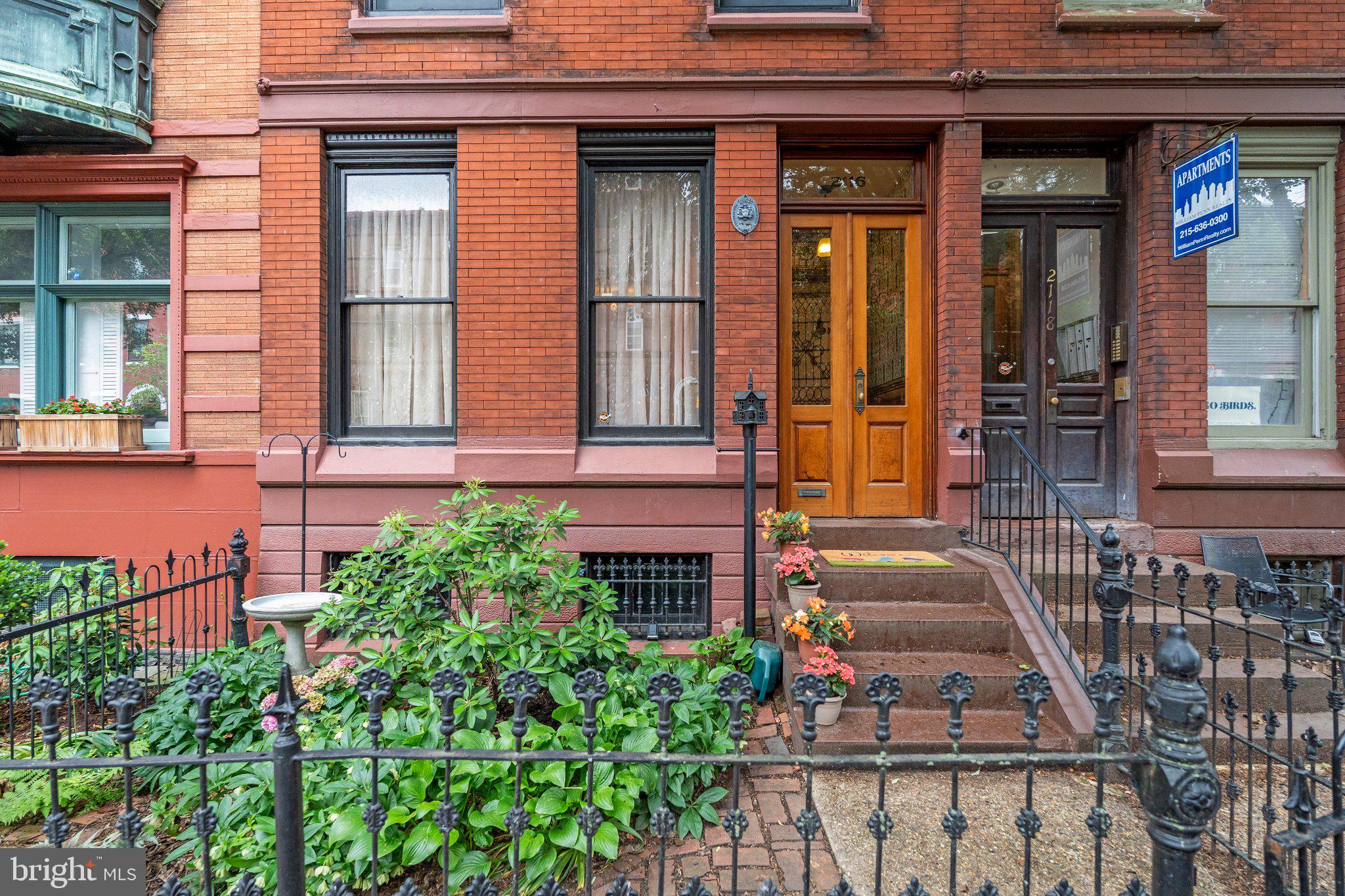 Welcome to 2116 Green Street, a captivating Victorian townhouse nestled in the vibrant Fairmount neighborhood of Philadelphia. This historic residence, originally built in 1854, offers a unique blend of timeless elegance and modern conveniences, providing a perfect sanctuary for those who appreciate architectural beauty and contemporary living.
Key Features:
Spacious Living: Encompassing almost 2,700 square feet, this home features four generously sized bedrooms and two full bathrooms, providing ample space for family living or entertaining guests.
Historic Charm: Delight in period details like inlaid wooden floors, stained glass accents, a beautiful staircase, and several stunning fireplace surrounds, all of which add a distinct character to the home.
Modern Comforts: The main level offers a seamless flow from the front parlor with a working fireplace to a dining area that opens to a modern kitchen equipped with high-end appliances and a feature island.
Private Retreats: The cozy sunroom opens onto a private deck, creating an ideal space for relaxation or intimate gatherings. The upper floors feature a library, a dressing room, and beautifully refurbished bathrooms echoing vintage designs.
Enhanced Amenities: Benefit from a 1 car attached garage, a wood-burning stove, a newer heating system, a comprehensive six-zone HVAC system, and a recently updated roof.
Convenient Location: Enjoy living in proximity to cultural landmarks like the Philadelphia Museum of Art, the Barnes Foundation, and the Rodin Museum, along with easy access to local dining and shopping options.
This exquisite property not only embodies the charm of historic Philadelphia but also offers the comforts of modern living, making it a delightful home for discerning buyers. Schedule a private tour to explore this remarkable home today!