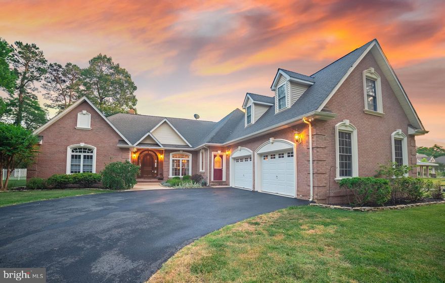 Are you looking for luxury living on the Potomac River? Look no more! Prepare to fall in love with this unique home, situated on 2.1 acres with 230' water frontage. With a large kitchen, formal dining room, family room, sunroom, and 4 En-suite bedrooms (4th bedroom currently used as office but can easily be connected to adjoining bathroom), there's room for everyone. Entertaining will be a breeze with the open floor plan. Breathtaking water views from almost every room will leave you in awe.  Light filled kitchen features granite countertops, 42" cabinets, drop in stove, electric cooktop, wine fridge, and ice machine. The extra counter space, box beam ceilings, and water views will make this a favorite room in the house.  Enjoy get togethers in the large family room with vaulted ceilings or take the party outside to the screened in porch or pool deck. Featuring a 32x18 saltwater pool with awning and separate 10x10 pool pump/storage house. Water sports, fishing, crabbing, kayaking...anything is possible when you're steps from the Potomac River with a 150' private pier! The pier is equipped with 16x10' side deck, 20,000 lb boat lift with remote control, jet ski lift, water, electric & lights. Deep water with low tide still reaching 5'. The detached brick front garage features a 900 sq foot apartment with private 10x8 deck. 2 car attached garage. Apartment is the perfect au pair suite with 1 BR, full bath, living room, and full-size washer & dryer.  Detached 3 car garage has half bath, separate HVAC, and it's own electric meter. This gorgeous and unique home was custom built with the love of water and luxury combined. Additional features: back-up generator, lawn sprinkler system, 3 zoned heating/air system, 30 year Timberline architectural shingles, Anderson patio doors and casement windows, and so much more! Enjoy a good game of golf...with the golf course just 5 minutes away. Flood insurance not required (per the seller).