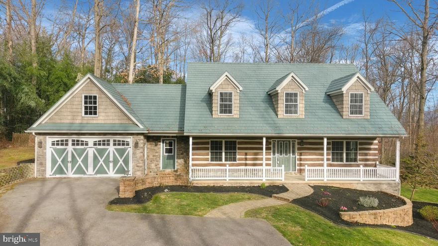 Welcome to your dream custom log home nestled on 3.32 acres of lush, wooded paradise! This picturesque retreat offers a perfect blend of rustic charm and maintenance-free modern amenities, like the concrete log siding and geothermal heating and cooling. You are greeted at the warm entry to this spacious floor plan boasting four bedrooms and two and one-half baths. Enjoy the wooded views from the dining and living rooms and stay organized in the convenient laundry/mudroom with its own front entrance. Custom hickory cabinetry adorns the first-floor office, the large kitchen and baths, and luxury vinyl plank flooring is found throughout the main level. Unwind in the luxurious primary en-suite, featuring vaulted ceilings and a private oasis for relaxation with a jetted soaking tub, separate shower, and large walk-in closet. Custom window seat benches and hard-wired window candles show attention to detail. Discover a versatile unfinished bonus room over the garage with its own back deck and entrance, perfect for a home office, media room or play area. The walk-out basement presents endless possibilities with a rough-in for a second kitchen and half bath, ideal for entertaining guests or creating a separate living space. Outside, a charming paver patio awaits, providing the perfect spot for al fresco dining or enjoying the tranquil sounds of the creek below, while overlooking the generous backyard. Escape to your own private retreat and embrace the beauty of country living with this exceptional custom log home. Don't miss your chance to make this serene haven yours! As a bonus, the Seller is leaving a large snow blower and patio table with six chairs, and if desired, a bunk bed and office desk! Private shared drive, please no drive by's without an appointment. Schedule your showing today!