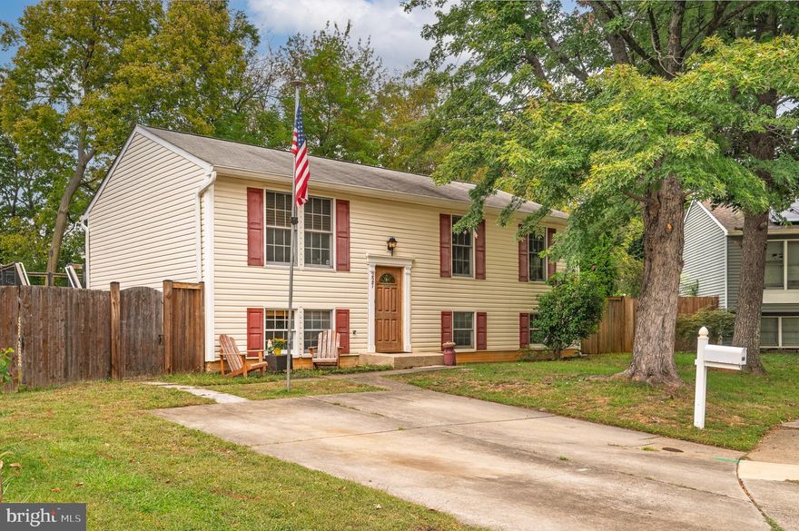 $25,000 PRICE IMPROVEMENT!!! This new price allows you to make cosmetic improvements that match your vision while adding equity!
Welcome to this charming split-foyer home, situated on a quiet cul-de-sac. This 2 story residence offers 3 bedrooms and 2 full bathrooms, combining comfort and functional living spaces.
The main level features a welcoming living room designed for relaxation or entertaining. Adjacent to the living room is an eat-in kitchen, providing ample space for casual dining and family gatherings. From the kitchen, step out onto the deck that overlooks the tree-lined backyard, ideal for morning coffee, summer barbecues, or enjoying quiet evenings outdoors. The backyard offers plenty of space for gardening, play, or simply relaxing.
The lower level adds versatility and entertainment options, including a family room, a  bar perfect for hosting, and a dedicated office space for working from home. A spacious utility room features a washer and dryer with plenty of extra room for organized storage.
Out front, the property offers a private driveway with parking for two cars and several mature trees. This home combines privacy with a friendly neighborhood atmosphere, while remaining close to schools, shops, amenities, and commuter routes.