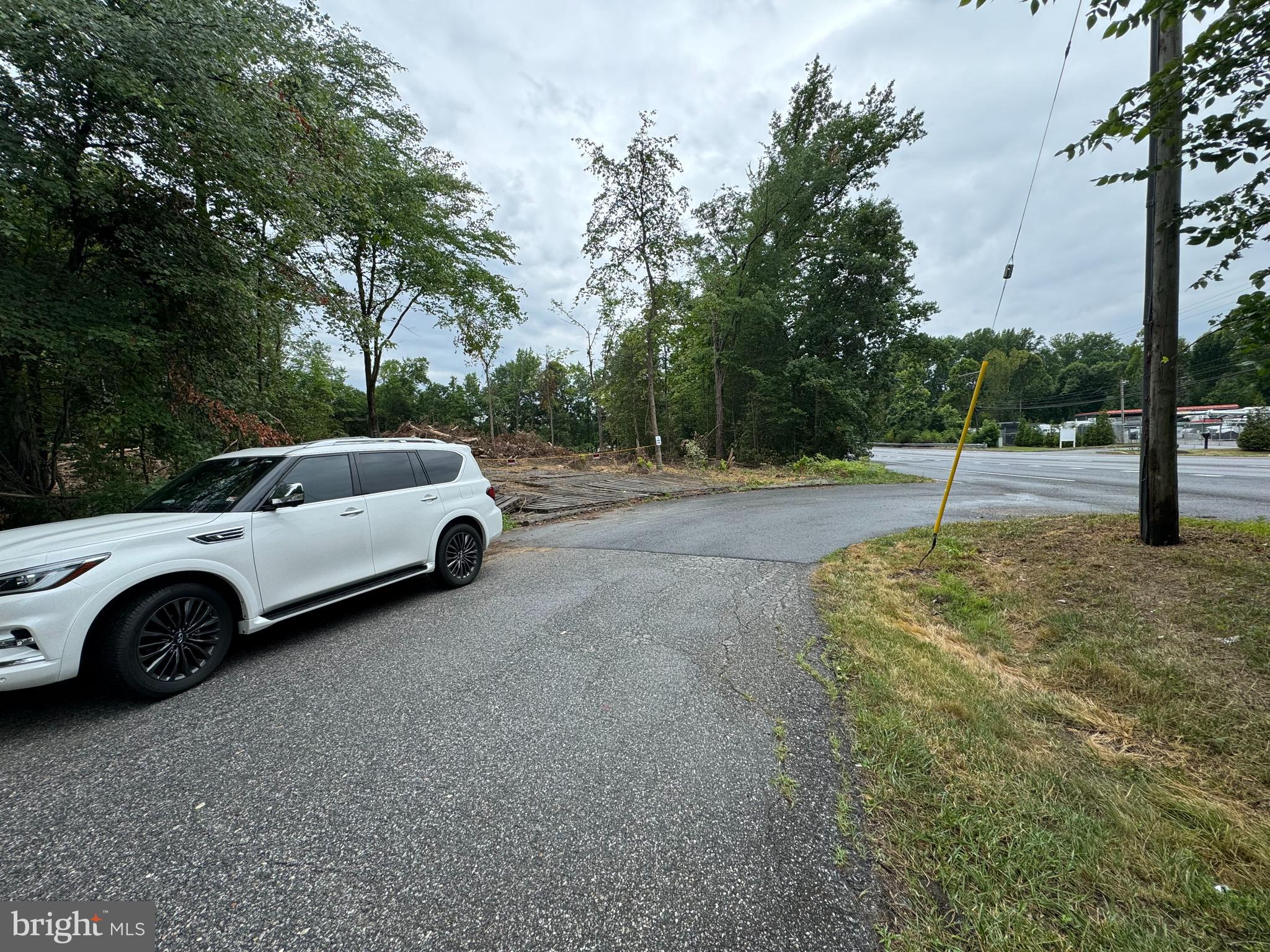 This property offers .95 acres of flat, cleared, and graveled C-4 zoned land, providing an exceptional development opportunity in Millersville. With direct access and high visibility along the bustling Rt. 3 corridor, this site boasts a prime location for a wide range of commercial uses. The property benefits from a remarkable traffic count of approximately 70,000 vehicles per day, ensuring maximum exposure and visibility for any business that chooses to establish itself here. The landlord is actively working on obtaining a grading permit, further enhancing the site's value by preparing it for additional graveling. This preparation not only facilitates immediate use but also reduces development time and costs for future tenants or buyers.
** AA county zoning classification** **Agents and tenants are to verify with county for usage**
C4 - Highway Commercial District
This District is generally intended for larger scale auto-oriented retail and service businesses along or near major traffic routes that serve local and regional residents as well as the traveling public. In addition to most commercial uses found in the C3 zone, automobile, truck, recreational vehicle and boat sales, rental and major repair facilities may be located in this District. Minimum lot size is 10,000 square feet. Maximum lot coverage by structures and parking is 85%. Maximum Floor Area Ratio is 1.0. Maximum height is 60 feet based on minimum setbacks and can increase to 72 feet provided setbacks are increased as per formula.