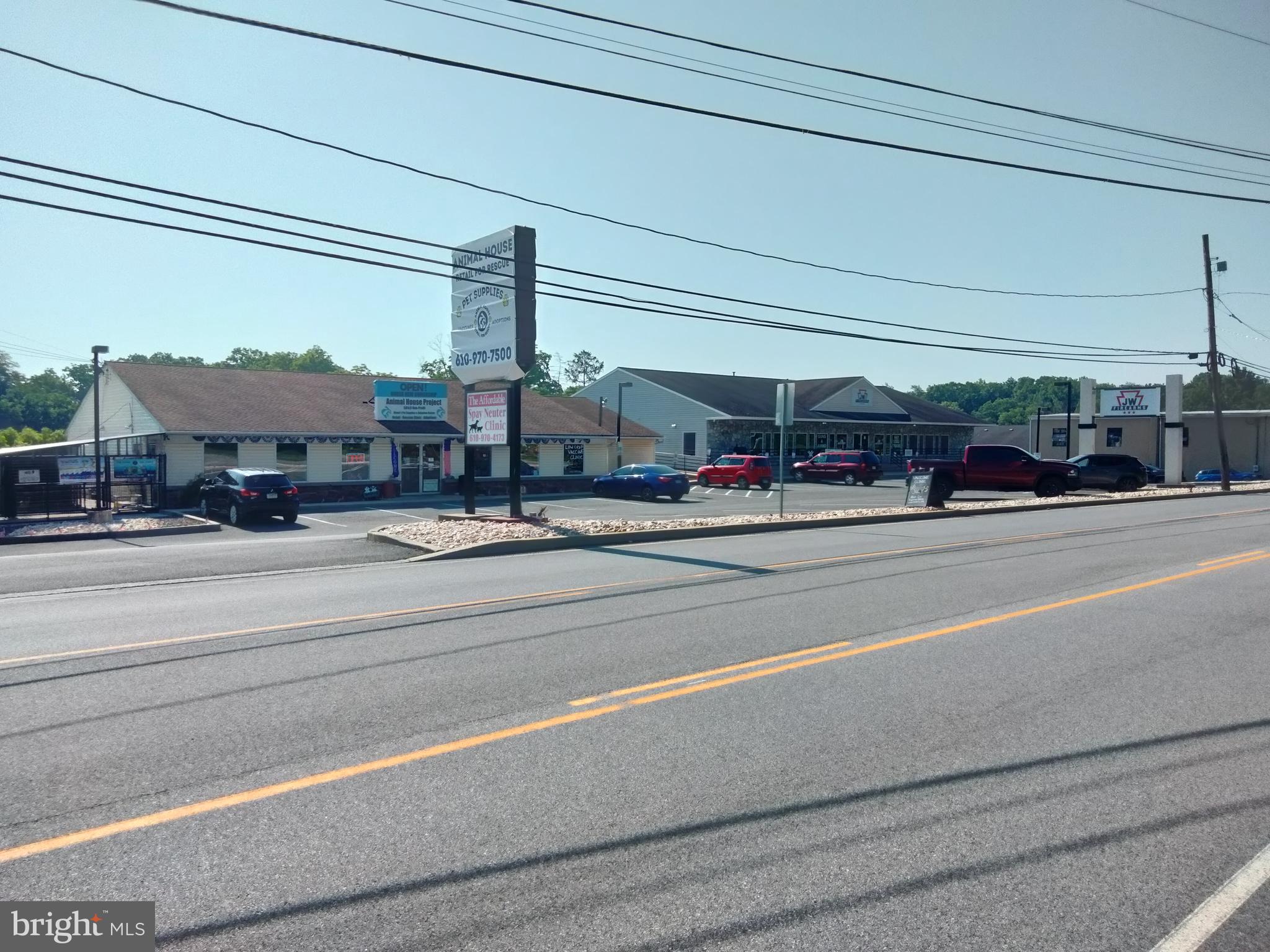 ANOTHER 422 OPPORTUNITY !!! This is a 3 building, 4 space investment property situated on 3+ acres. Property is 100 % leased. Current NOI is approx $150k/year. Taxes for '25 at 2% discount are $25336, insurance is $12575 and CAM is $25000. 3 tenants are multi-year terms, 1 tenant prefers renewing year-to-year, and has done so for 15-20 years. Seller specifies sale, "As Is". Rear home on 1.44 acres can also be purchased for additional monies and is also zoned C-1. Total square footage of all leased space is 23,000 and this includes upper and lower levels. Zoning and flyer attached under docs.