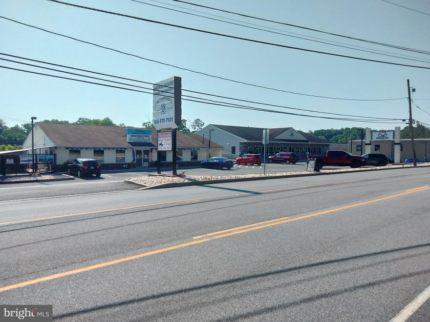 ANOTHER 422 OPPORTUNITY !!! This is a 3 building, 4 space investment property situated on 3+ acres. Property is 100 % leased. Current NOI is approx $150k/year. Taxes for '25 at 2% discount are $25336, insurance is $12575 and CAM is $25000. 3 tenants are multi-year terms, 1 tenant prefers renewing year-to-year, and has done so for 15-20 years. Seller specifies sale, "As Is". Rear home on 1.44 acres can also be purchased for additional monies and is also zoned C-1. Total square footage of all leased space is 23,000 and this includes upper and lower levels. Zoning and flyer attached under docs.