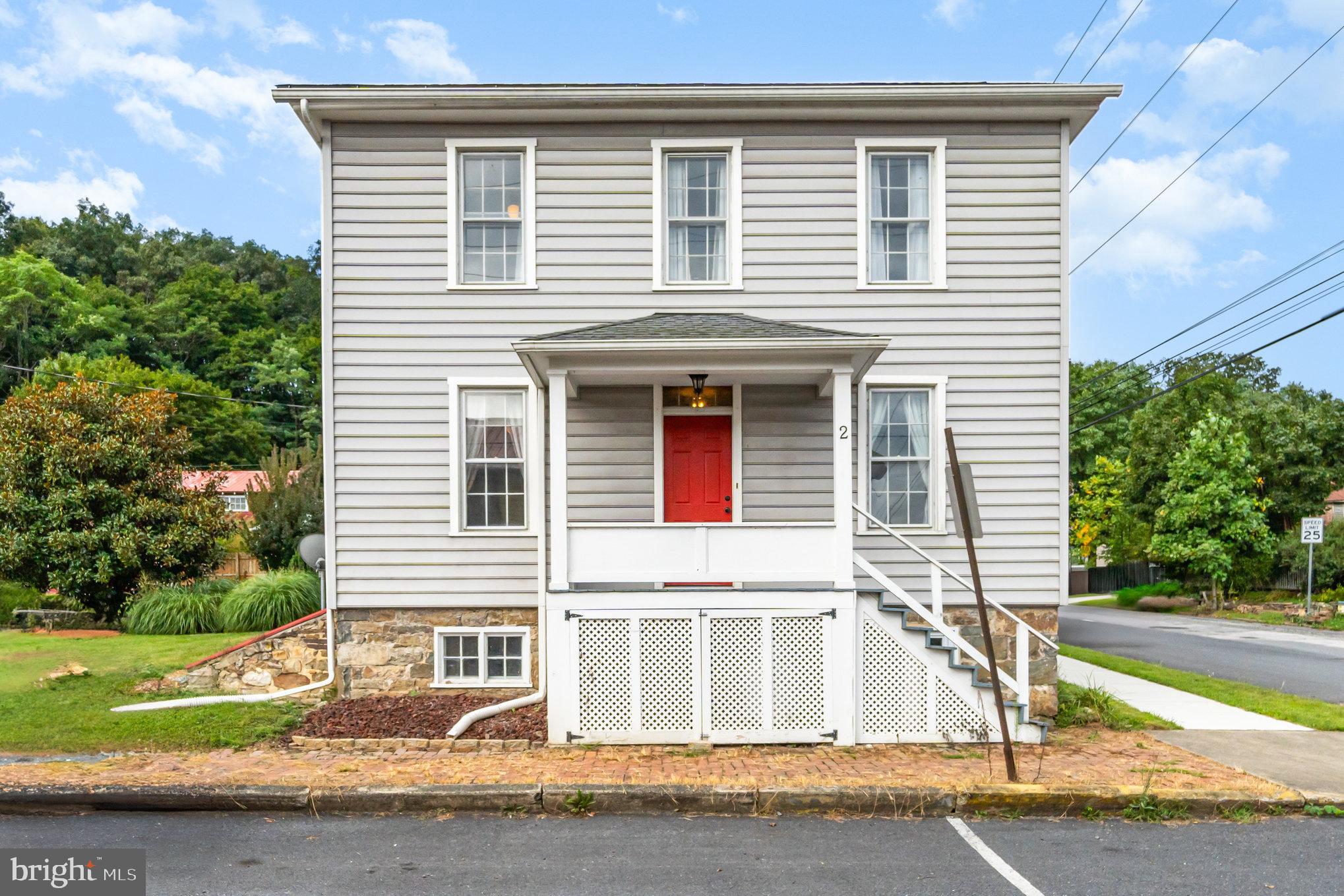 This charming traditional home, built in 1889, offers a delightful blend of historic character and modern comfort. Nestled in a welcoming community, it features a spacious layout with 4 bedrooms and 2.5 bathrooms, perfect for gatherings or quiet evenings by the corner gas fireplace. The exterior boasts a lovely porch and patio, ideal for enjoying warm evenings or morning coffee. The property includes a detached garage and additional outbuildings, providing ample storage and workspace. With a very good condition rating, this home is ready for you to move in and make it your own. Located in a vibrant neighborhood, residents enjoy easy access to local parks, schools, and public services, fostering a strong sense of community. Explore nearby recreational areas, perfect for outdoor activities, and take advantage of the excellent educational opportunities available. This home is not just a place to live; it's a place to thrive.