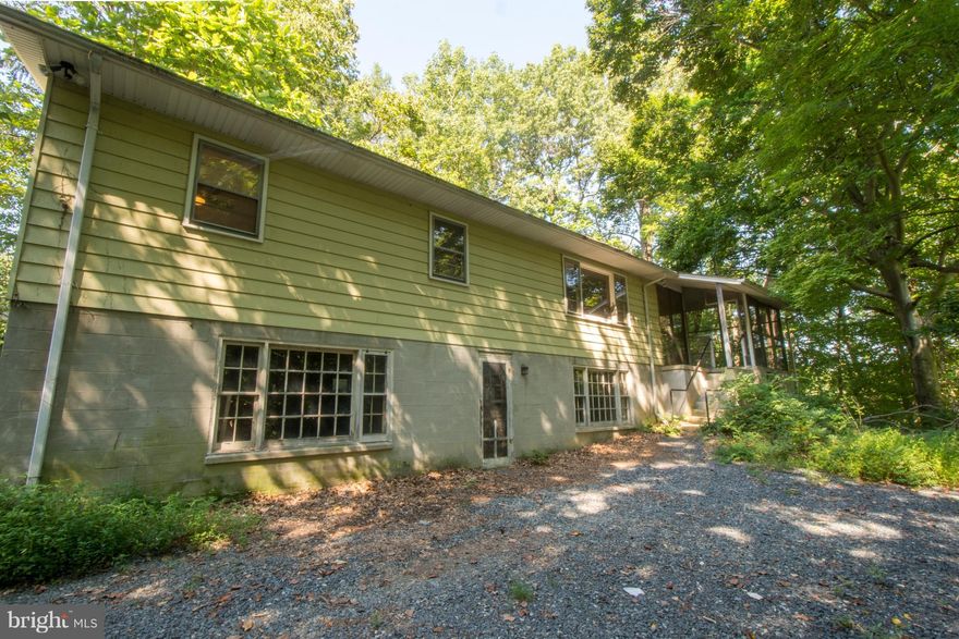 A true waterfront diamond in the rough!Two parcels of land one with wonderful water frontage on Beards Creek. House offers a great footprint for renovations. Inside original hardwood floors throughout. Basement has a fireplace. Close to commuting routes to DC and Baltimore. Make it a spectacular waterfront!