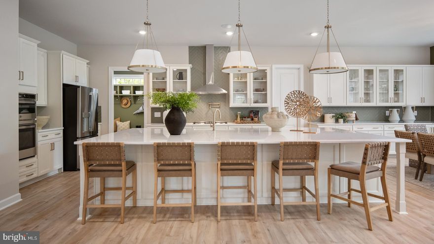 Entertain with ease in the grand Richmond floor plan. The kitchen features a large island that opens to the breakfast area and great room. The dining room, butler’s pantry, living room, powder room, mudroom, and 2-car garage are just a few of the highlights of the Richmond first floor. Add a fireplace, morning room, turn the living room into a study, or expand with a screen porch to make the home fit your needs. Escape to the serene primary suite on the second level which features an oversized walk-in closet with two sections and a private bathroom with a walk-in shower. A laundry room and walk-in closets for the additional 3 bedrooms can be found on the second level. Add a rec room, media room, bedroom, and full bath in the optional lower level. Rare opportunity to own a premier Northern Virginia homesite offering the perfect blend of privacy, natural beauty, and potential. Picturesque 15-acre parcel in desirable Loudoun County with stunning mountain views and a peaceful setting. A natural tree-lined perimeter provides added seclusion and enhances the property’s scenic character. Ample space for a thoughtfully designed residence and outdoor living. Enjoy the tranquility of country living with convenient access to nearby restaurants, wineries, and commuter routes. **Photos may differ from actual home and are for illustrative purposes only*