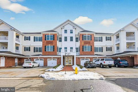 Photo of 15251 Royal Crest Drive #103, HAYMARKET, VA 20169 (MLS # VAPW2112500)