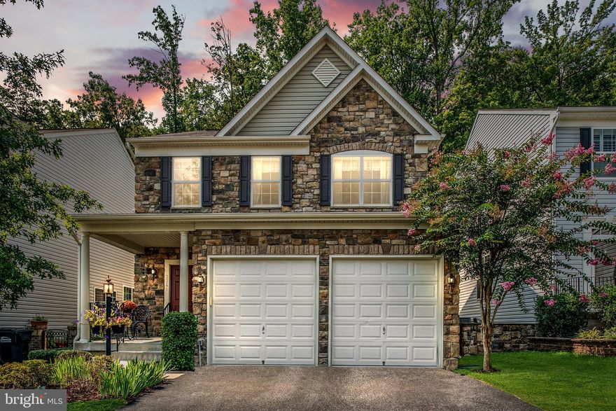 Back on the market! Buyers financing fell through. You'll love this gorgeous, colonial home with a spectacular private wooded scenic view in the beautiful Eagles Pointe neighborhood. This 4-bedroom, 2.5 bath home with a spacious 2 car garage provides 2031 square feet of living space.  As you enter this immaculate home you will see hardwood floors throughout the first floor. The separate living and formal dining room is perfect for entertaining guests. In the open gourmet kitchen you will find  stainless steel appliances, island and granite countertops. The kitchen overlooks a generous-sized family room with a gas fireplace! Off the kitchen is a patio that is perfect to sip on your morning coffee surrounded by gorgeous trees. Upstairs you will find 4 bedrooms and 2 full baths. All the bedrooms are very generous in size.  The master bath includes a separate walk-in shower, soaker tub and double sinks. Enjoy the laundry room that is conveniently located upstairs near the 3 additional bedrooms with another full bath. The unfinished basement has plenty of room for storage and additional bedrooms, if needed.  In June of 2020, the outdoor A/C condenser unit was replaced with a Carrier 3-ton 14 seer unit. Eagles Pointe is less than 4 miles from Potomac Mills and Stonebridge Shopping and 8 miles from Quantico. Easy access to I-95, commuter lots and VRE. This community has so much to enjoy including a beautiful community lap pool, fitness center, tot lots, tennis courts and walking trails! Private and accessible to so much is why this gorgeous home is truly a gem! Shows like a model home and is move-in ready!