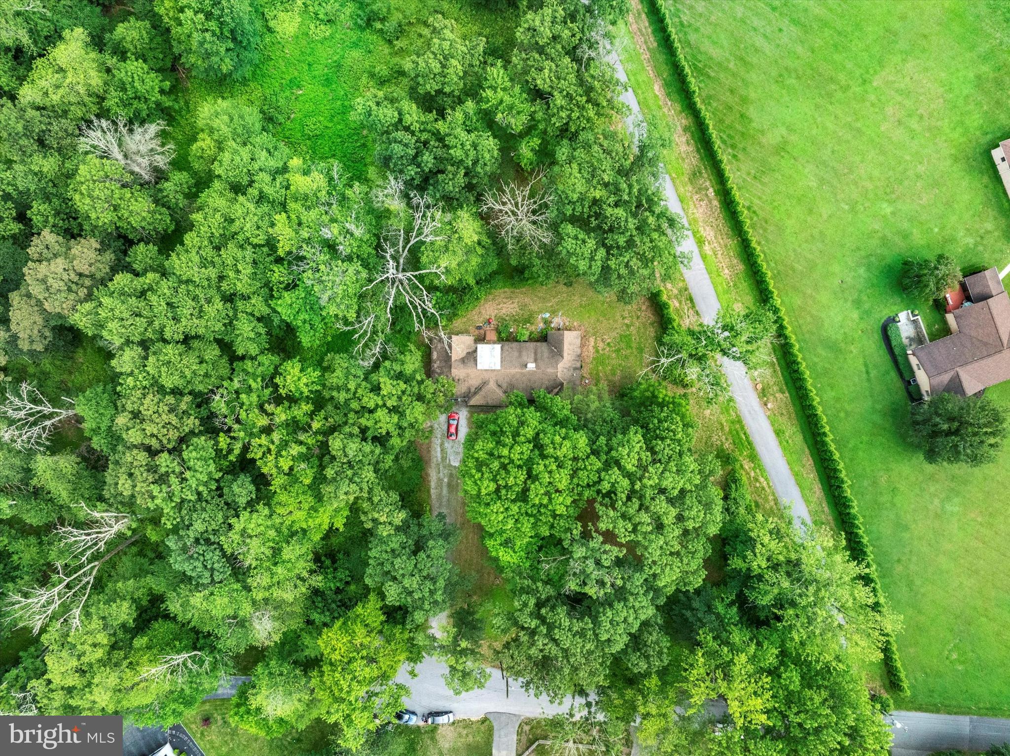 A rare and valuable opportunity to own over 7 acres in the award winning West Chester Area School District. Tucked at the end of a quiet cul de sac in one of Chester County’s most desirable locations, this expansive and private parcel is ideal for those looking to build a custom estate or retreat surrounded by nature. Large lots of this size and setting are nearly impossible to find in the area, making this a truly exceptional offering for buyers seeking space, seclusion, and flexibility. The property features mature trees, a private stream, and a peaceful landscape perfect for luxury living with potential for gardens, a pool, equestrian use, or additional outbuildings. Utilities are already in place, making this an attractive alternative to raw land. There is no builder tie-in, giving you full control to bring your vision to life. While there is an existing home on the property, it would require significant renovation and most buyers will see this as an opportunity to start fresh. Despite its quiet and secluded setting, the property is just minutes from East Goshen Park, top-rated schools, and the shops, restaurants, and cultural attractions of downtown West Chester Borough. A rare chance to create a one-of-a-kind residence on a premier lot in an unbeatable location.