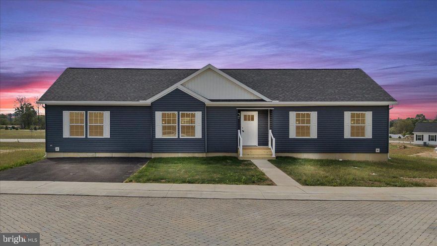 Welcome to Northwoods Homes, the Lehigh Valley’s newest residential community where nature welcomes you home. Located in Lehigh Township, Walnutport, this new neighborhood blends modern design, energy efficiency, and low-maintenance living on leased homesites with public water, sewer, and underground utilities. Surrounded by open green space and tree-lined roads, Northwoods offers the comfort of new construction in a peaceful setting minutes from Northampton, Walnutport, and major routes. The Riverbend Model at 3983 Hastings Road by Commodore Homes of Pennsylvania delivers 1,683 sq ft, 4 bedrooms, 2 baths, and a flexible office or den—all on one level. The open-concept layout features luxury vinyl plank flooring, Whirlpool stainless-steel appliances, tile backsplash, farmhouse sink, and walk-through pantry. The living room highlights an electric fireplace, while the private primary suite includes dual vanities, walk-in closet, and ceramic-tile shower. Built to HUD energy standards, this home offers R-31 ceiling, R-19 wall, and R-22 floor insulation, 200-amp electric, and high-efficiency propane heat. Paved driveways and community-maintained landscaping provide a clean, cohesive appearance. Additional floor plans from 1,387–1,683 sq ft are now available within Northwoods Homes, offering new, attainable single-level living across the Lehigh Valley. Multiple options available beyond this particular model.