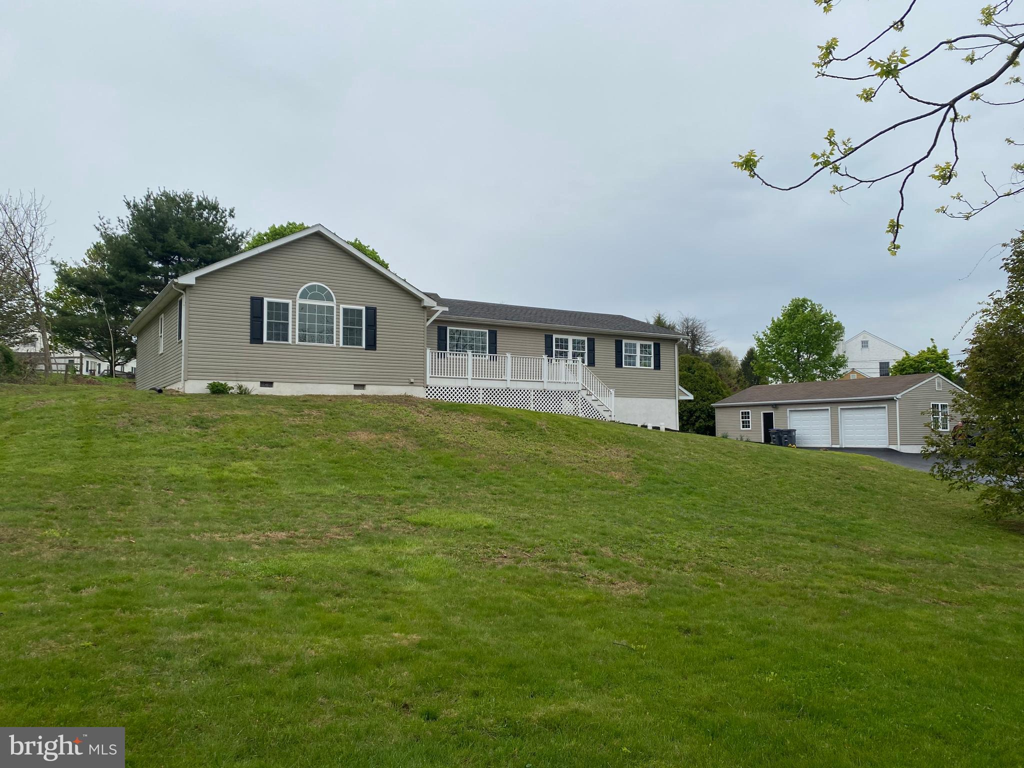 Incredible opportunity to own this completely and thoughtfully renovated 4 bedroom 2.5 bath rancher in Downingtown School district on just over an acre!  When you pull in, you will notice the newly paved driveway and fresh patio and sidewalk.  Enter via the maintenance free composite deck and you will be wowed by the hand-scraped hardwood floors that encompass all main living areas. The luxurious master bedroom has 9' ceilings, many windows which fully flood the room with rejuvenating light, new carpets  and a walk in closet. The en-suite master bath features tiled floor, oversized walk-in shower, new vanity and fixtures. The family Room features dramatic tray ceiling, ceiling fan and lots of room to enjoy time together with those you love.  It also has a slider which leads to nice sized deck, perfect for a barbecue.  The kitchen is completely brand-new from top to bottom, with white shaker style cabinets with dovetail drawers, granite countertops, stylish glass tile backsplash, recessed lighting, stainless steel appliances and a large pantry.  Adjoining the kitchen is a full dining room with hardwood floors and plenty of room with additional slider offering plenty of light and backyard access.  The large living room features gorgeous picture window, shadow box trim, crown molding custom butler area and character filled white washed brick ready to accept a wood stove if desired.  The hall bath has been completely renovated with new tiled floor, tub, tiled shower area, vanity and fixtures.  Bedroom 2 has an en-suite which is fully tiled and convenient.  2 other graciously sized bedrooms are also on main level, each featuring new carpeting and oversized closets.  This home has been completely renovated with quality in mind, with a has modern roof, windows, new central air, 2 zoned heat including radiant heat, new water heater, new well pressure tank, new doors and fresh paint everywhere.  Outside, you will appreciate the 2.5 car garage with new doors, openers, and gutters. There is plenty of room for all your storage needs.  Your new home has even been wired for a generator hook-up.  Location is just minutes to GEYA fields, Marsh Creek, Turnpike and Levante Stables.  Make this stunning home yours today!!