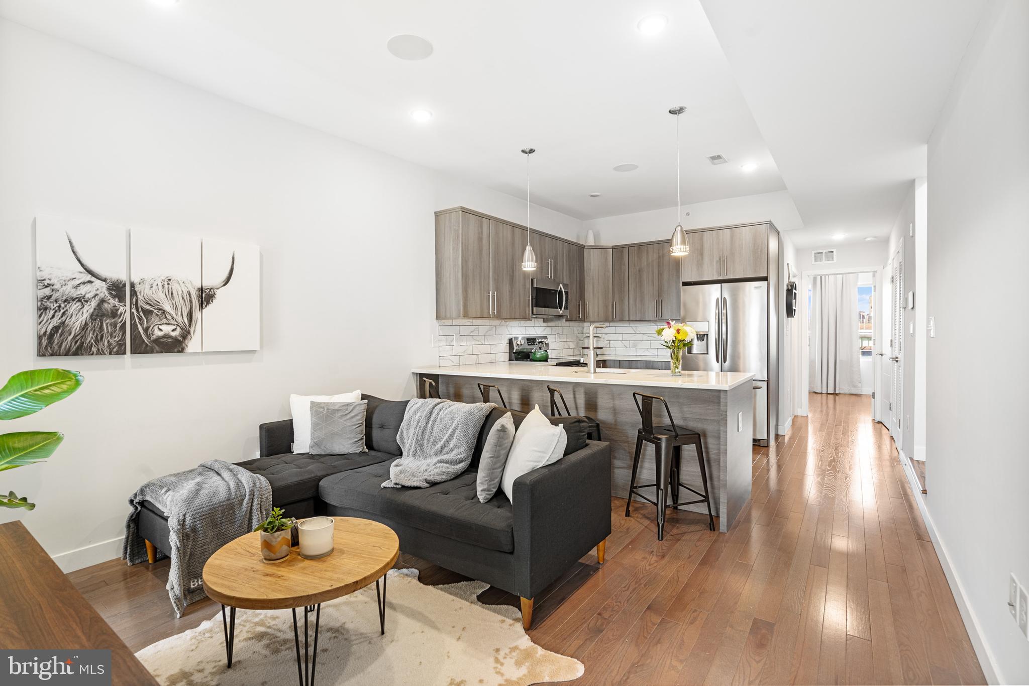 Welcome to this stunning 2-bedroom, 1-bath condominium, offering modern living at its best! Located in a newer construction building, this bright and spacious home features stylish, high-quality finishes throughout. The open-concept living area is perfect for entertaining, with large windows flooding the space with natural light and offering city views. The kitchen boasts sleek countertops, stainless steel appliances, and plenty of cabinetry for all your culinary needs.
Both bedrooms are generously sized with ample closet space, and the updated bathroom includes contemporary fixtures and finishes. Enjoy the convenience of deeded parking, ensuring you always have a spot waiting for you.
Take in breathtaking views from the roof deck, a perfect spot to relax or entertain friends. With 5+ years remaining on the tax abatement, this home offers an excellent opportunity for both comfortable living and long-term savings.
Located in a prime neighborhood, close to dining, shopping, and public transportation, this condo is the perfect blend of modern convenience and luxury. Don’t miss your chance to call this incredible property home!