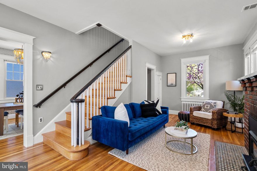 Welcome to 803 Islington Street, a beautifully maintained brick home that blends timeless character with modern comfort, ideally located on a picturesque tree-lined street in downtown Silver Spring.
From the moment you arrive, the welcoming front porch invites you to sit back, relax, and enjoy the vibrant neighborhood. Step inside and you’ll be instantly charmed by the gracious 9-foot ceilings, refinished hardwood floors and freshly painted walls throughout (2025), and the show-stopping original staircase with its detailed handrail—an architectural gem that sets the tone for the home.
The sun-drenched living room offers incredible natural light and a cozy wood-burning fireplace, perfect for both quiet evenings and lively gatherings. Flow seamlessly into the generous dining room, ready for holiday dinners or everyday meals. The updated kitchen features granite countertops, stainless steel appliances, and a convenient pantry—a smart blend of style and function.
Upstairs, you'll find three well-sized bedrooms and a full bath, each offering treetop views and lovely natural light. The lower level expands your living space with a guest bedroom and ensuite bath, ideal for visitors or an au pair, plus a versatile family room for movie nights, playtime, or a home office setup.
Step outside and you’ll find a grassy backyard—just the right size for gardening, pets, or play. A stone patio offers the perfect spot for dining al fresco or summer lounging. And then, the pièce de résistance: a newly installed (2021) creative studio space that’s truly one of a kind. This detached gem features a spacious work area, dedicated meeting space, half bath, and an airy loft—ideal for artists, remote work, guest overflow, or even your next great business idea.
In addition, the home includes leased solar panels, helping reduce your energy bills while supporting a more sustainable lifestyle.
This home offers the perfect blend of historic charm and thoughtful updates in one of Silver Spring’s most walkable and convenient locations—close to parks, shops, restaurants, and Metro.