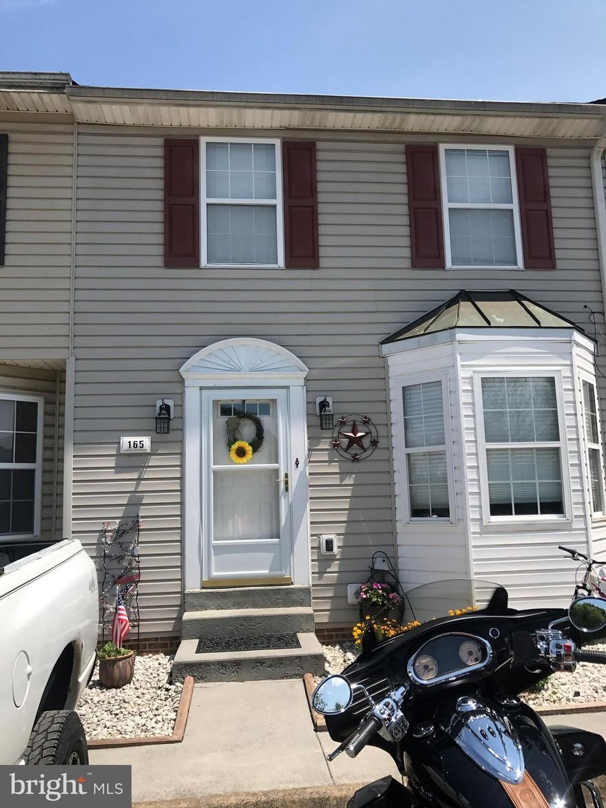 Amazing townhome in pristine condition. Beautiful views of the Blue Ridge Mountains from the front porch.  Home boast of 2 bed with 3 full baths and 1 half bath.  Nice size backyard with plenty of interior and exterior space for entertaining.  This is a perfect townhome in the heart of Woodstock.