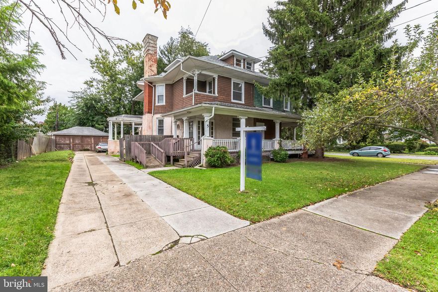 This spacious Victorian-era Colonial twin beckons to you from the street behind the wide front lawn. From the front porch and through the vestibule, you'll enter a large living room. The hardwood floors  extend past the quarter-turn stairs into a sizable dining room with bay windows that also leads to a covered side patio. A practical kitchen leads to a mud room with plenty of room for pantry storage. An additional back staircase from the kitchen provides convenience to the upper floors. The second floor features a full bathroom and three bedrooms. Up on the third floor, you'll find two more bedrooms and a full bath that gets plenty of light. Out back is a modest yard with a detached garage large enough to hold multiple cars while providing room for storage and a workspace. The long driveway also provides plenty of extra off-street parking. This property is perfect for an investor looking to add some modern touches to a stately home or an owner interested in sprucing up this overlooked delight! Sweat equity is guaranteed as  comparable homes in the area have sold for $300k!