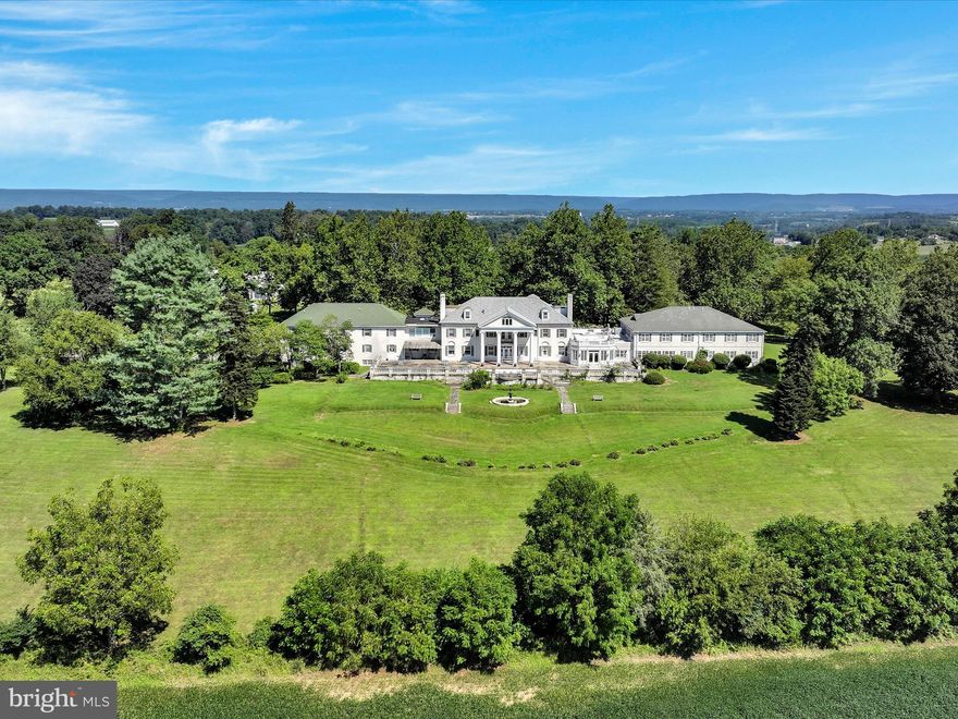 Welcome to HILL FARM ESTATE and discover the potential this historically significant 23.8-acre property has to offer! Once the private residence of U.S. Congressman and industrialist Aaron S. Kreider, this Federal-style mansion was later converted into a personal care home operating with 43 private rooms between the main & upper level, multiple common area/gatherings rooms, dining rooms, a commercial kitchen, administrative offices, a huge finished basement and even more space in the finished attic. 
The grand terrace is offering sweeping views of the scenic grounds, stretching all the way to Mount Gretna. A separate carriage house adds 7 residential units (three 2-BR and four 1-BR apartments) with 2 units currently being tenant occupied, offering immediate income opportunities. Set in a serene, park-like environment with mature trees and open green space, the property offers a rare combination of historic character and functional capacity. With existing infrastructure already in place, the estate presents a compelling opportunity for continued use as a care facility, conversion into a hospitality venue, wellness retreat, residential community, or adaptive reuse development, all subject to zoning and approvals.
Whether you're an investor seeking steady income, a developer exploring a unique project, or a visionary ready to write the next chapter for this storied property, Hill Farm Estate invites endless possibilities!