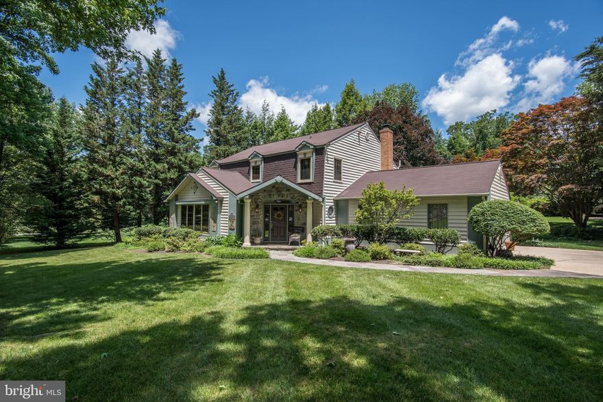 Phenomenal award winning custom home nestled on a scenic lot in The Village of Oakland Mills. Property updates and highlights: two major additions, HVAC, water heater, radon remediation system, Pella windows and sliders, Siding and Tyvek wrap, whole house wireless alarm system, CAT5 wiring throughout the home, and landscaped lighting. Boasting; beautiful hardwood floors, sunbathed windows, decorative lighting, crown molding, chair railing, wood burning fireplace, two gorgeous additions, and an exceptional open floor plan. Prepare your favorite meals in the beautiful kitchen adorned with sleek counters, new stainless steel appliances and gas cooktop/oven, stainless steel appliances, breakfast bar, and a casual dining area. The inviting family room will surely impress complemented with a wood burning fireplace, soaring vaulted ceiling, sunbathed floor to ceiling windows, skylights, and deck access. Formal living and dining rooms highlighted with crown molding, chair railing, and intimate lighting. A main level laundry room with a janitors sink for convenience, mudroom and a powder room conclude the masterfully designed main level. Travel upstairs to the inviting master suite featuring a custom walk-in closet and gleaming hardwood floors. Relax your cares away in the tastefully updated luxurious master bath boasting double vanities, an oversized soaking tub, and a glass enclosed shower with seating and ceramic tile. Three graciously sized bedrooms and a full bath conclude the upper level sleeping quarters. The lower level features a recreation room, game room or an optional bedroom, and additional storage. Host barbecues from the comfort of the expansive deck overlooking a hot tub, fire pit, and a superior scenic setting