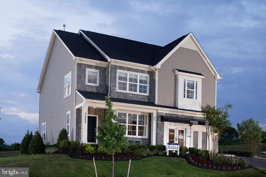 Brand New Beckner under construction for Fall Move In!! Still time to personalize this home with your own selection of flooring, cabinets and countertops to make it just the way you want it!
Front entry garage with porch welcomes you into this perfect home with a beautiful backyard backing to mature trees. Prepare all of your family favorites in the kitchen with gourmet stainless steel appliances. The private study is tucked away in the rear of the home, ideal for working from home. Take the oak stairs to the 2nd level where there are 4 bedrooms, 4.5 Baths, plus a loft area great for kids or additional study spaces.  Spacious Primary Bedroom with 2 walk in closets and a secondary bedroom with its own en-suite bathroom.   Massive Finished Rec room with 9' ceilings and with finished full bathroom.
Nestled in the heart of sought-after Clarksburg, Bellamy is conveniently located just 1 mile from I-270 & Stringtown Rd. Here, you'll find a limited selection of 50 homes with both single-family and townhome options available. And of course, all your favorite local destinations are within easy reach.
Photos Similar while construction is ongoing